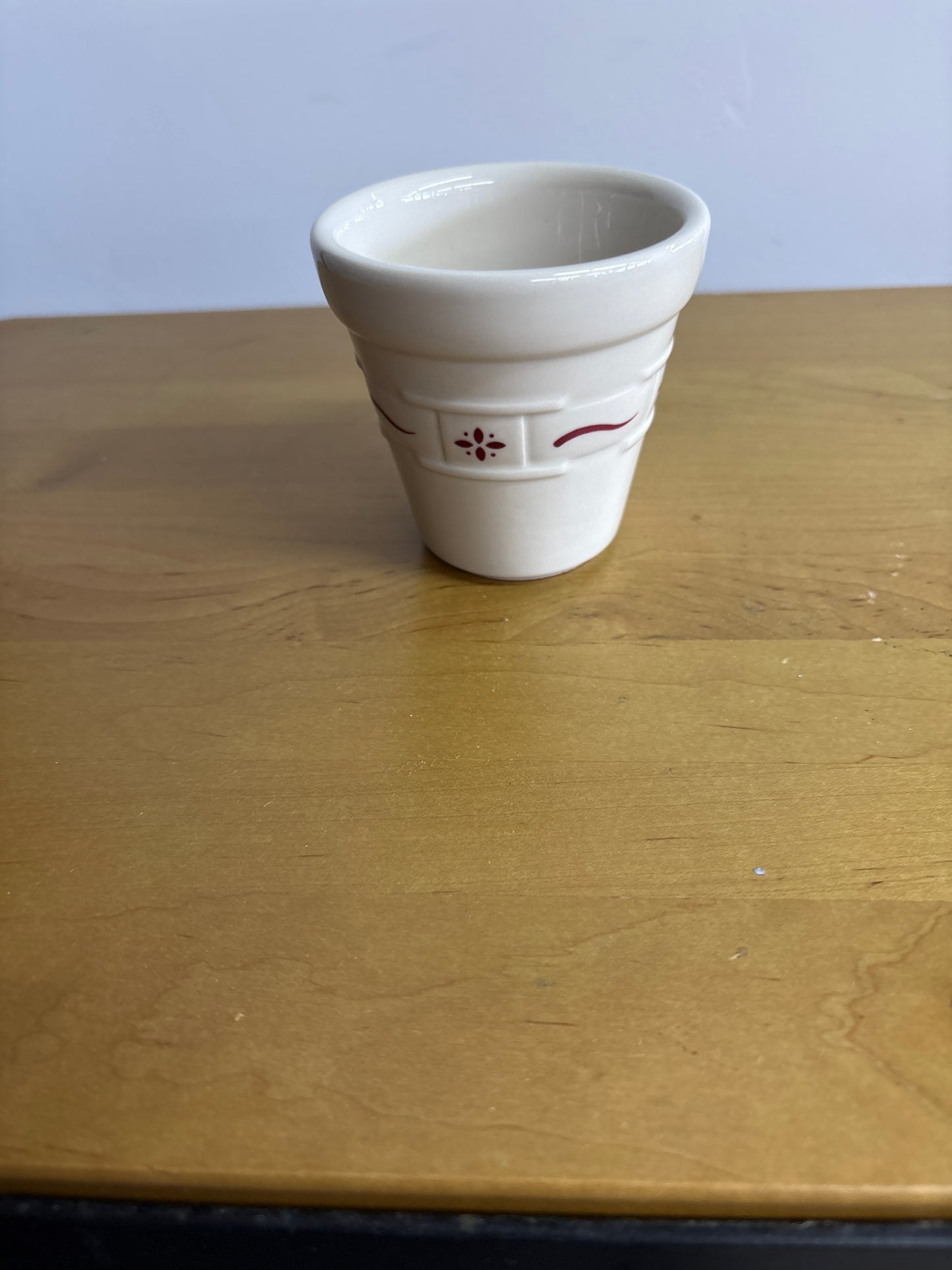 Longaberger Small Flower Pot in Traditional Red, no Saucer. May have melted candle in it.