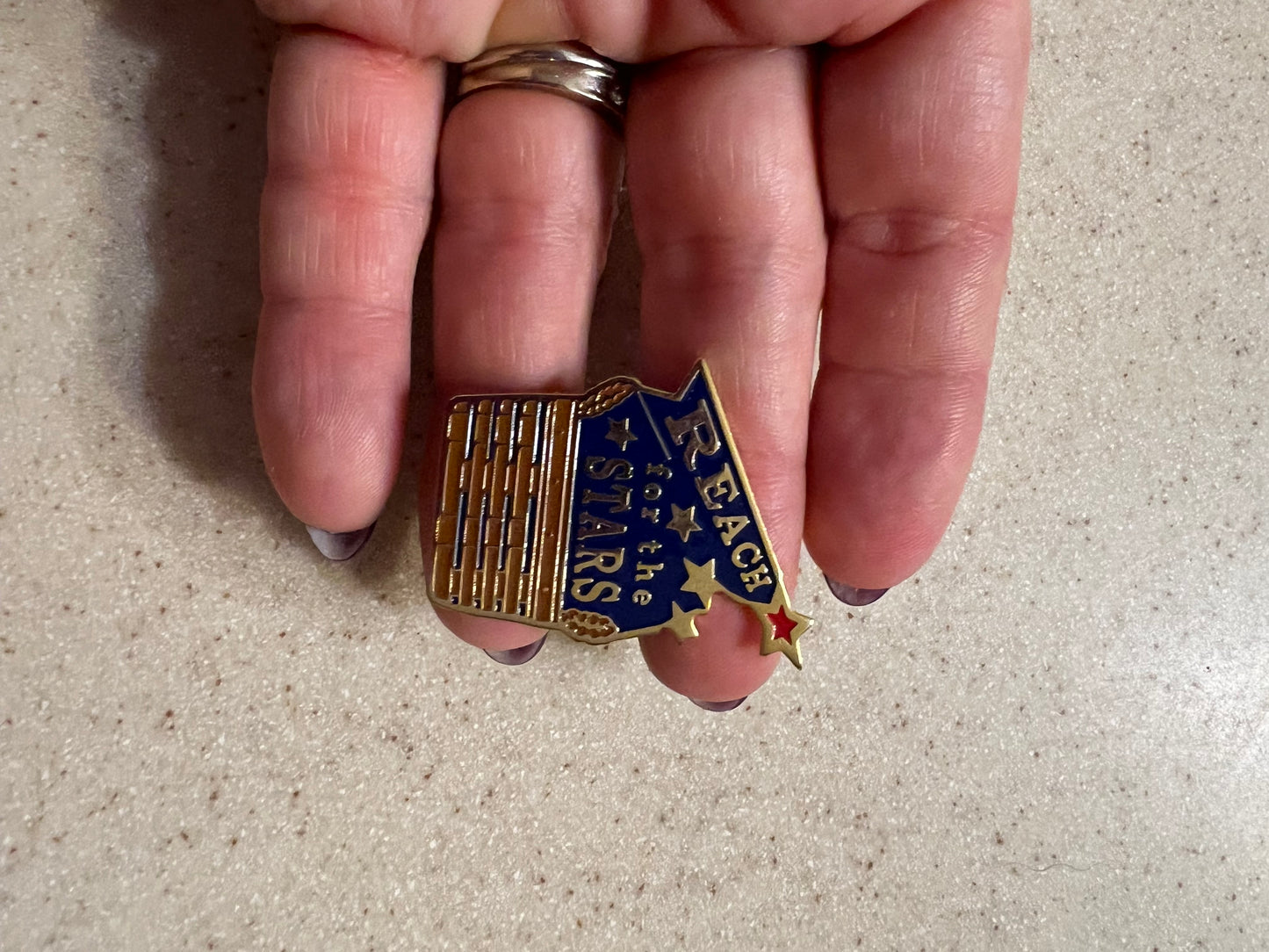 Reach for the stars pin