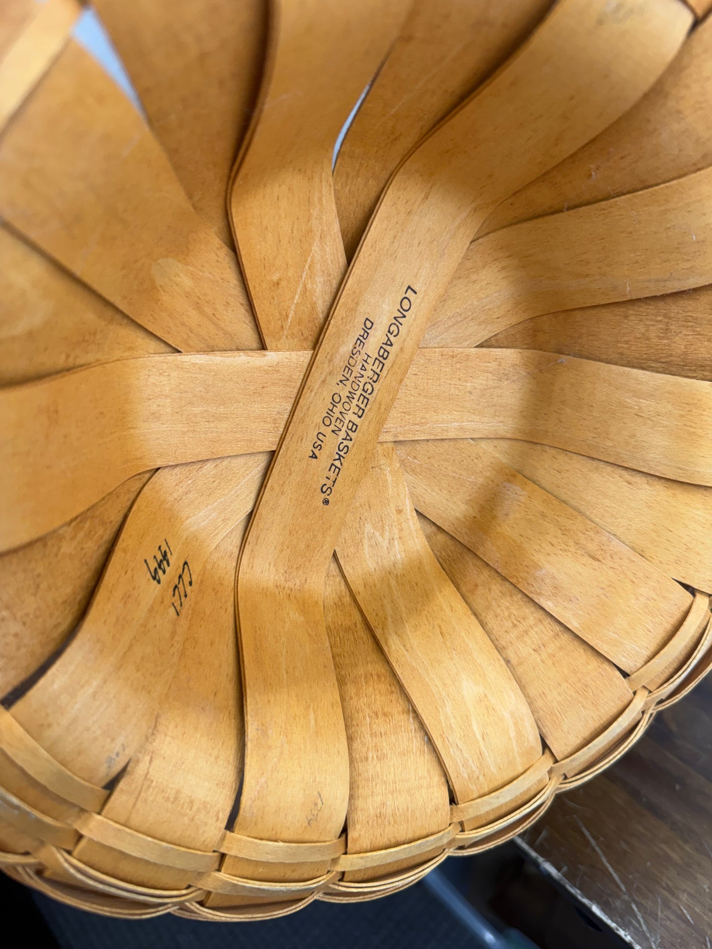 Longaberger large fruit basket with protector (has a cracked splint and spots on basket)