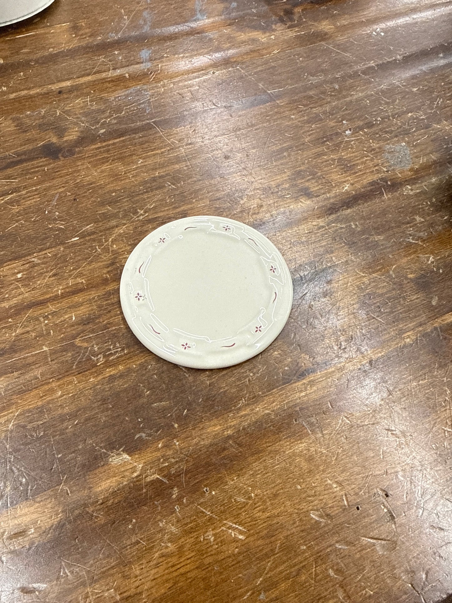 Longaberger pottery chip sample in traditional red