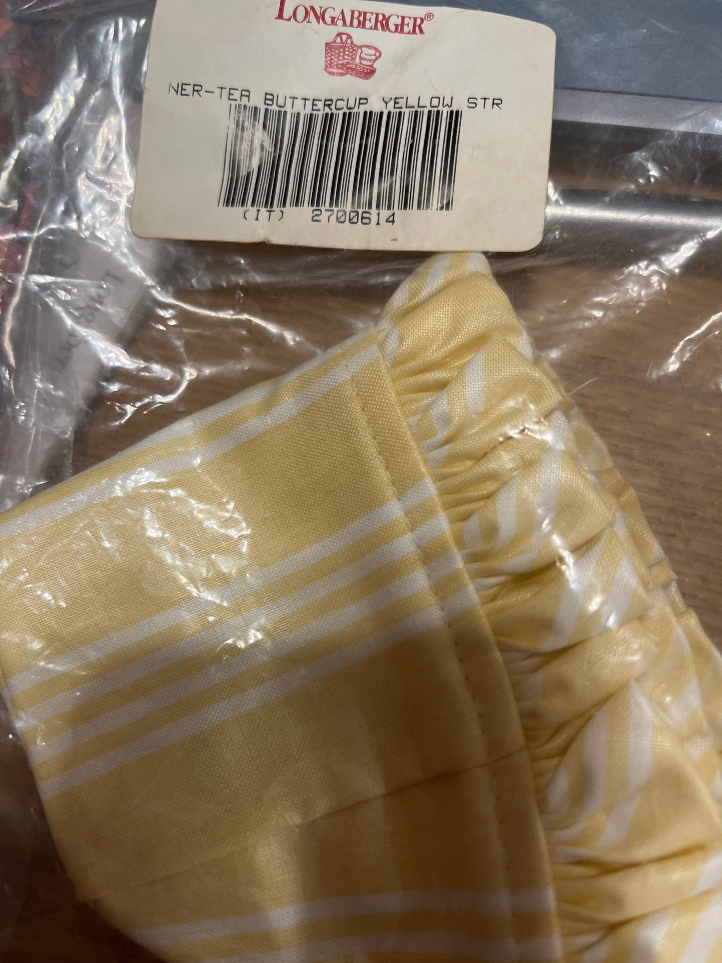Longaberger tea liner in buttercup yellow stripe