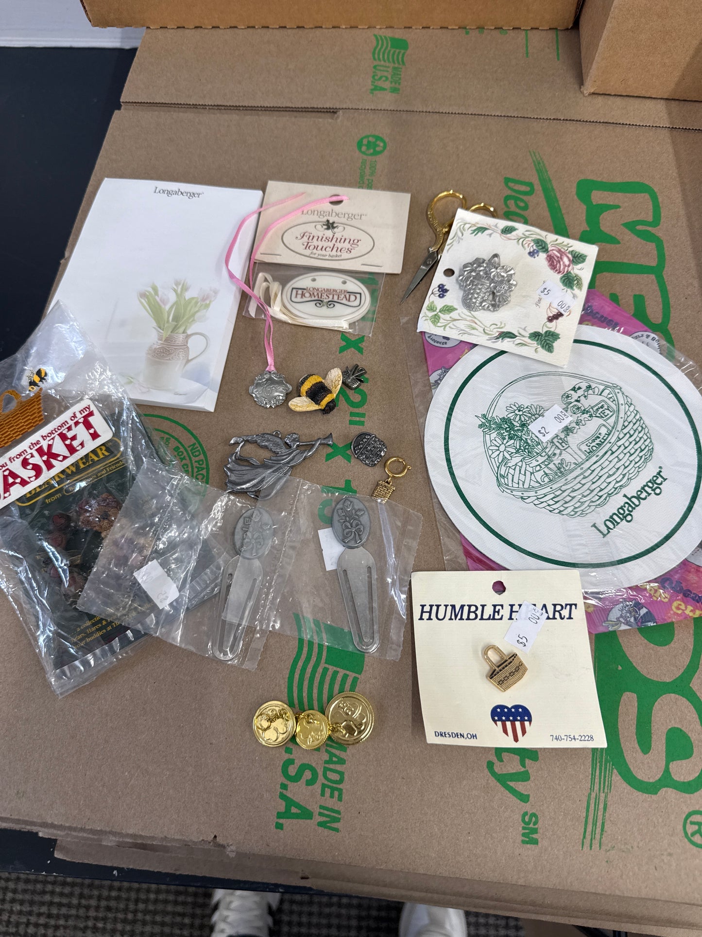 Longaberger and homestead items sold as a lot (pins, tie ons, pad of paper, ornament, rubber jar gripper, paper clips , scissors, magnet)
