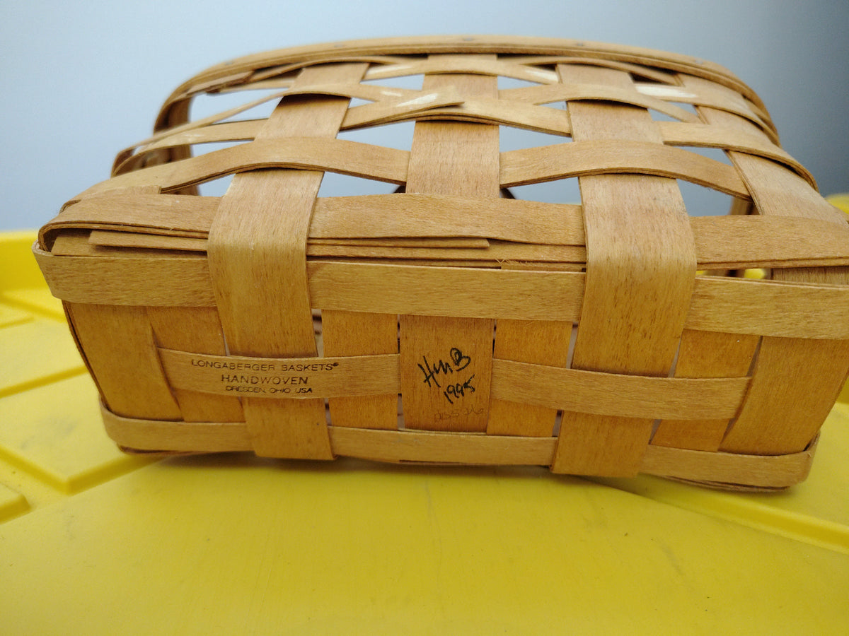 Longaberger basket - missing splints and has blemishes