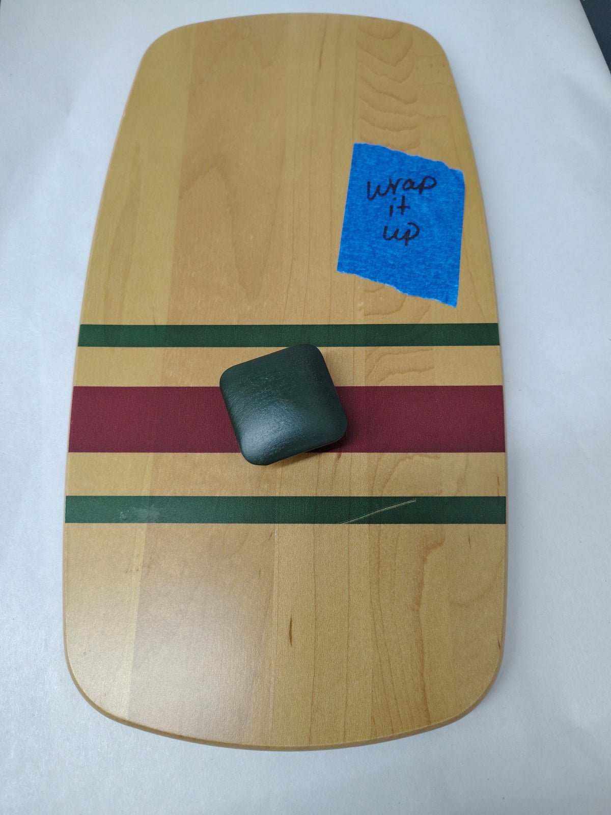 Longaberger wrap it up lid. Has scratch on green stripe