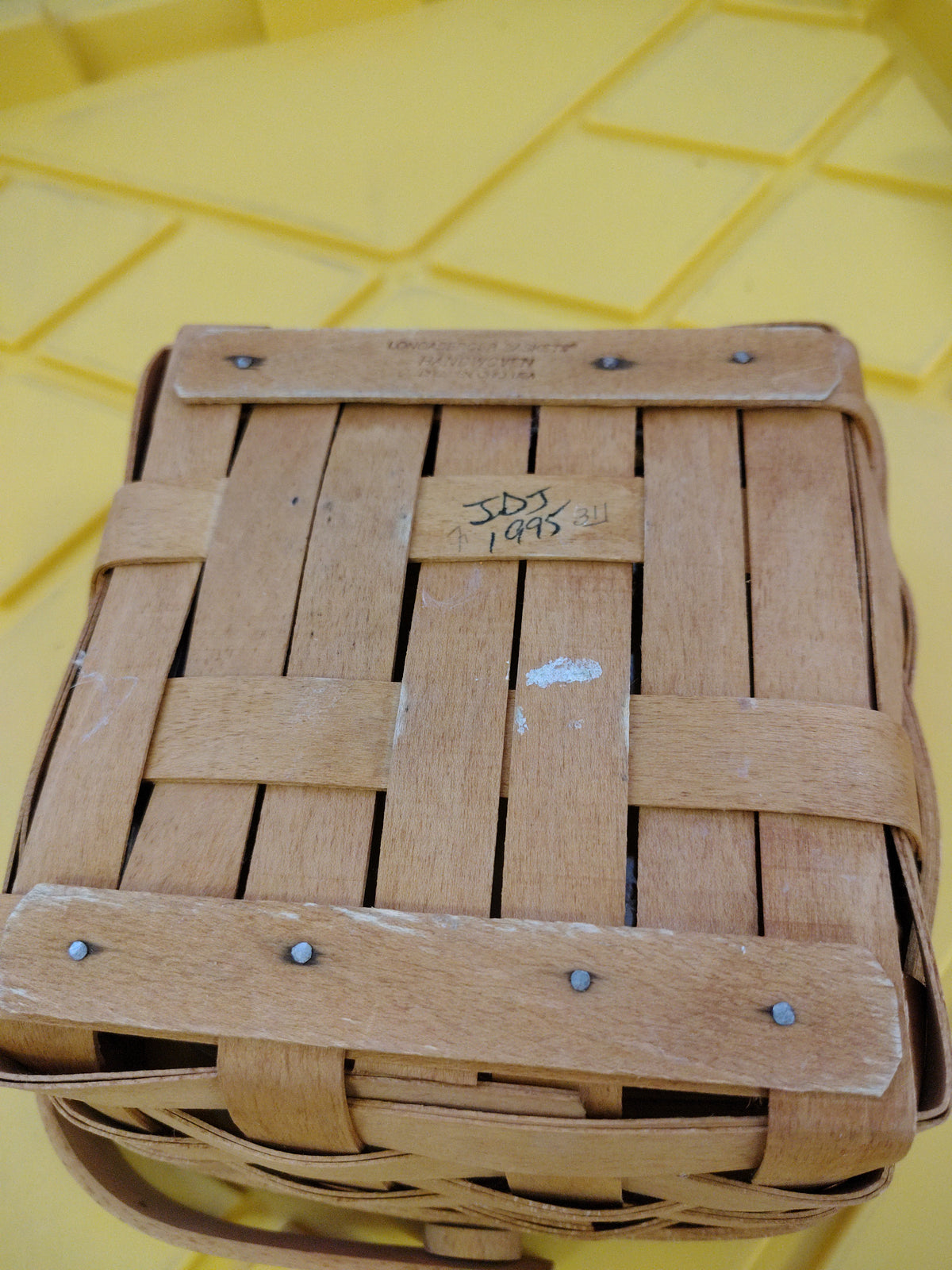 Longaberger medium berry basket with protector, has some discoloration