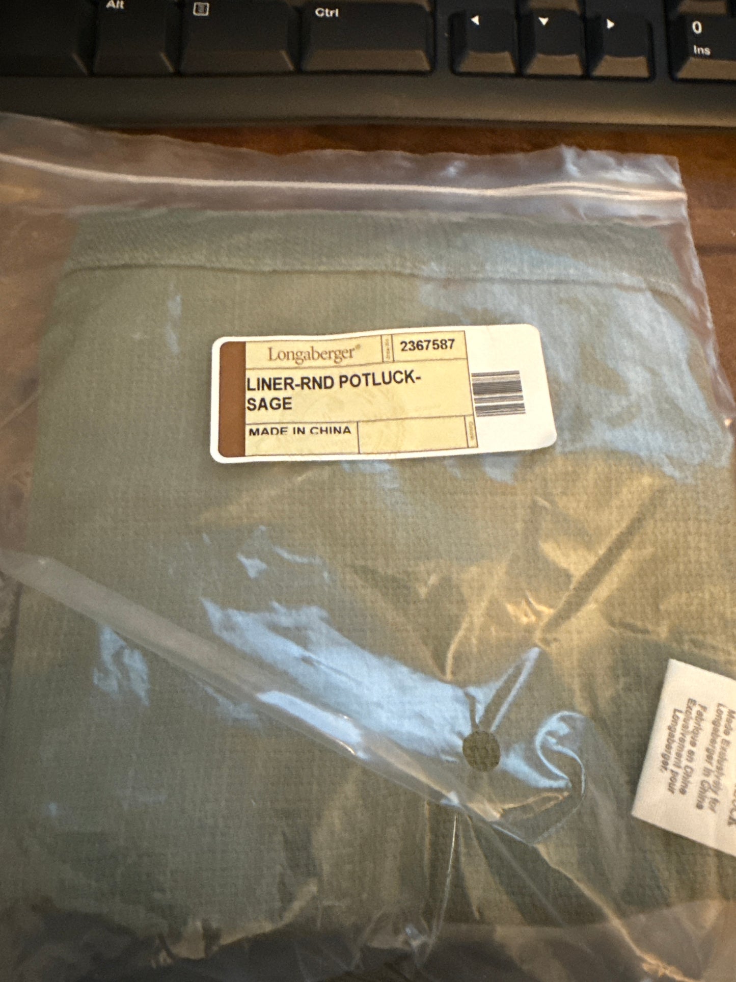 Longaberger round potluck liner in sage