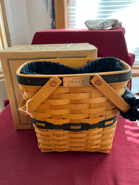 Longaberger Collectors Club membership basket with liner and handle grip