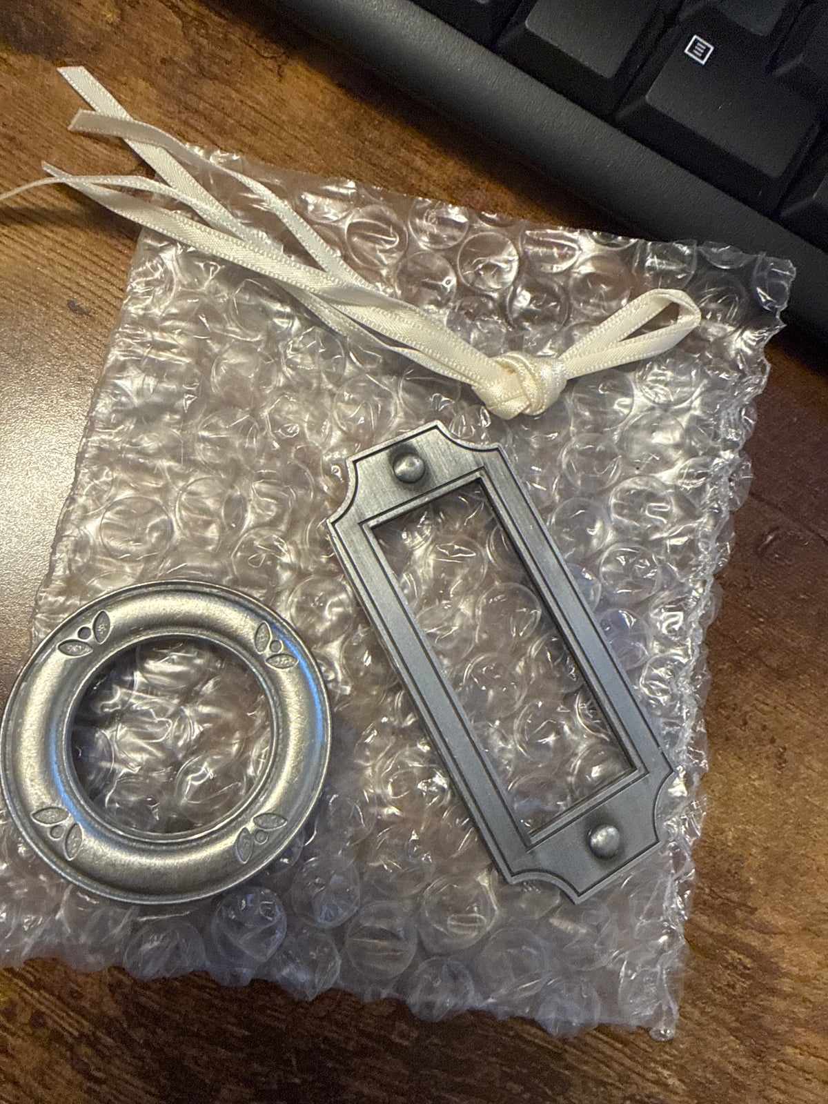 Longaberger rectangle and round pewter tie ons- no labels in package