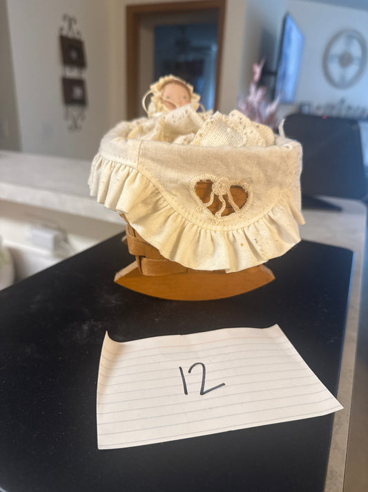 Longaberger cradle with doll (liner needs washed)