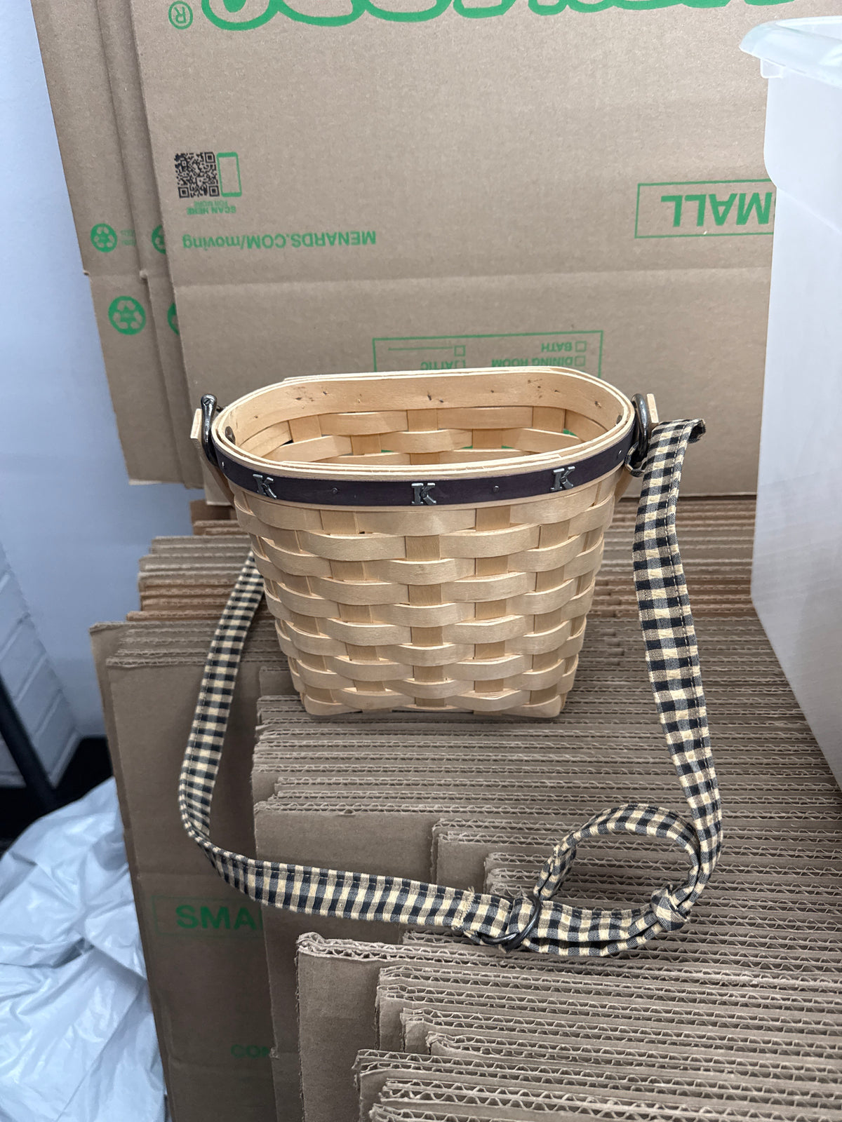 Longaberger purse basket with letter K tacks around edge of basket