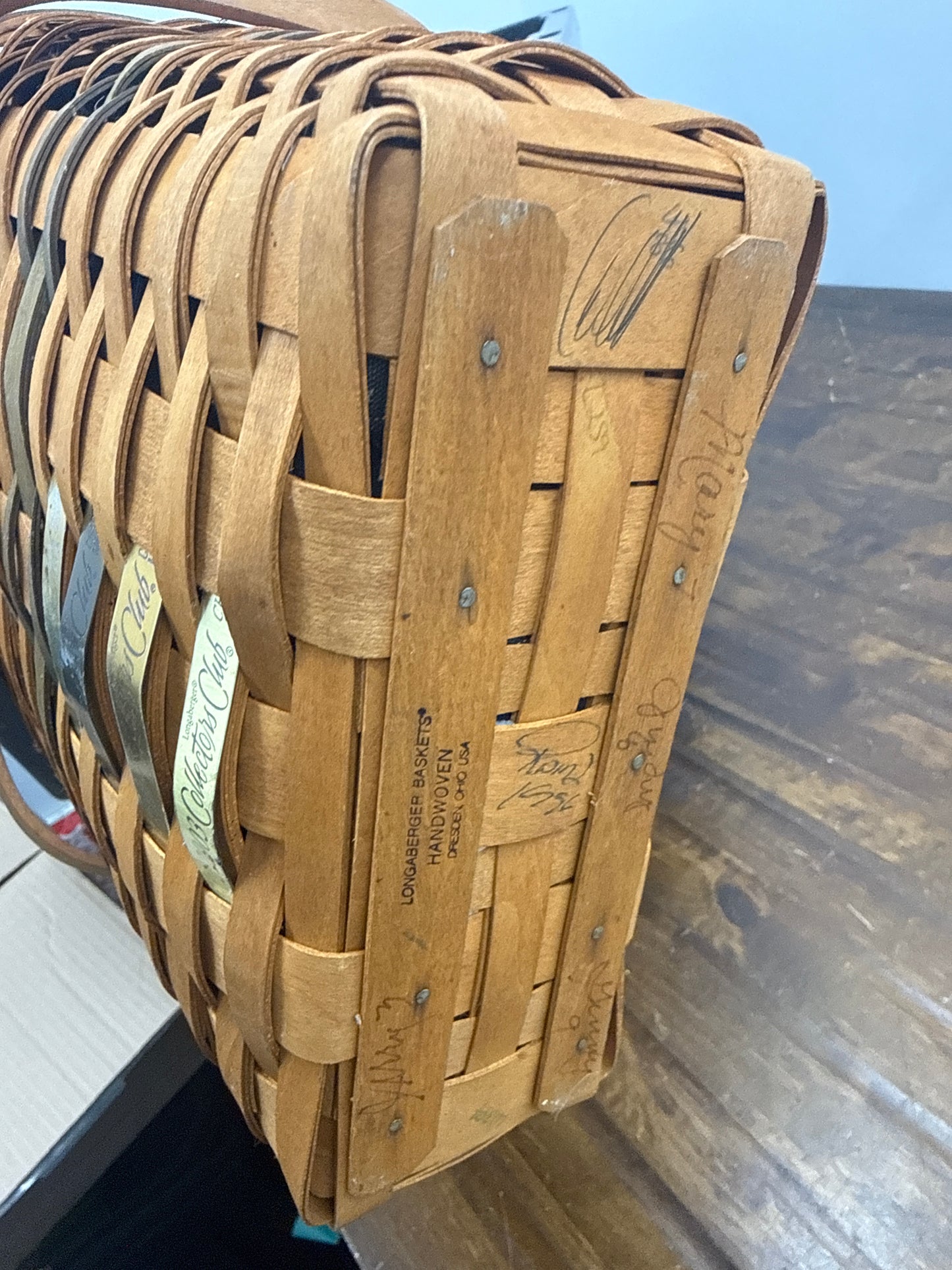Longaberger membership basket with liner and protector and handle grip (is very dusty and will need cleaned)