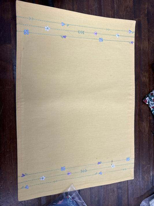 Homestead yellow placemats -a couple of them need ironed
