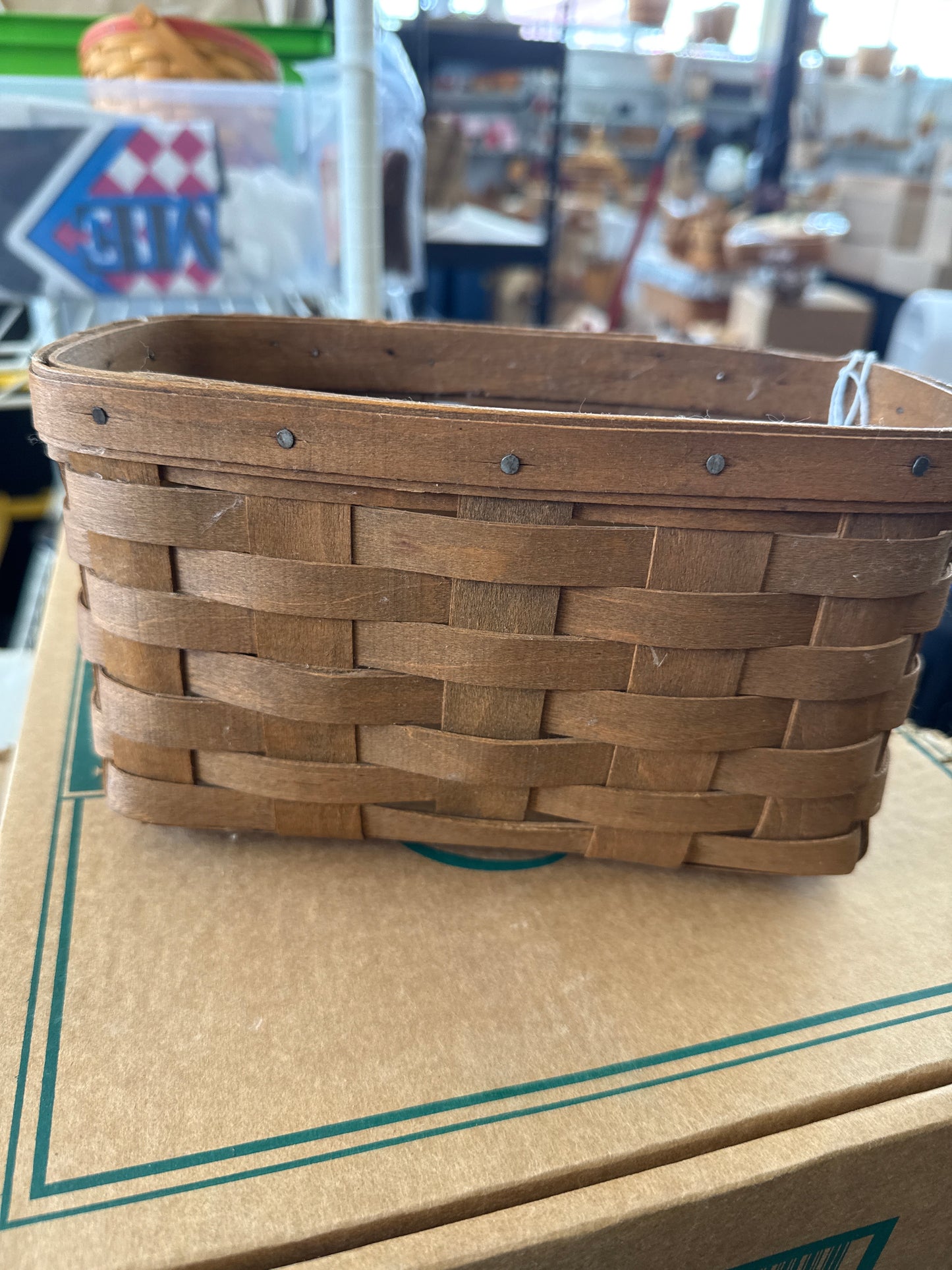 Longaberger medium key basket -handle is broken off and there is rubbing in the back of basket