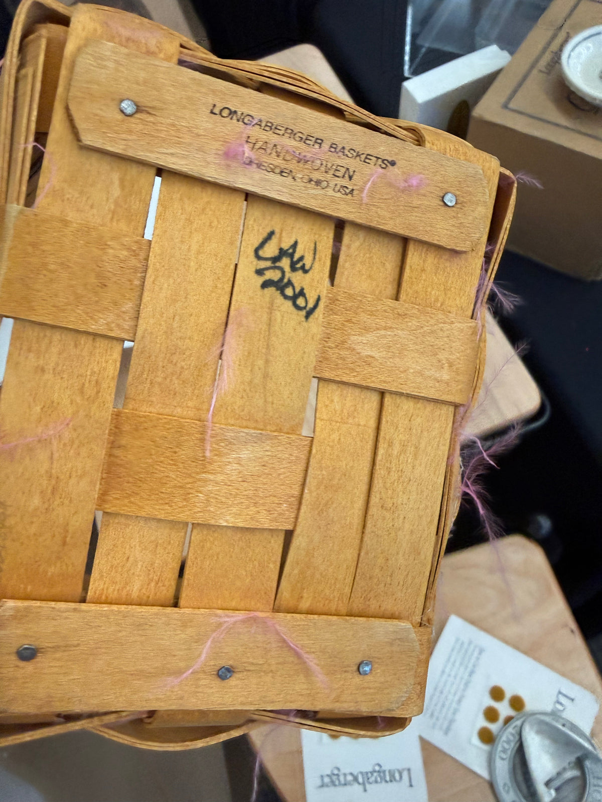 Longaberger award basket ( has pink feathers attached to it so will need cleaned up)