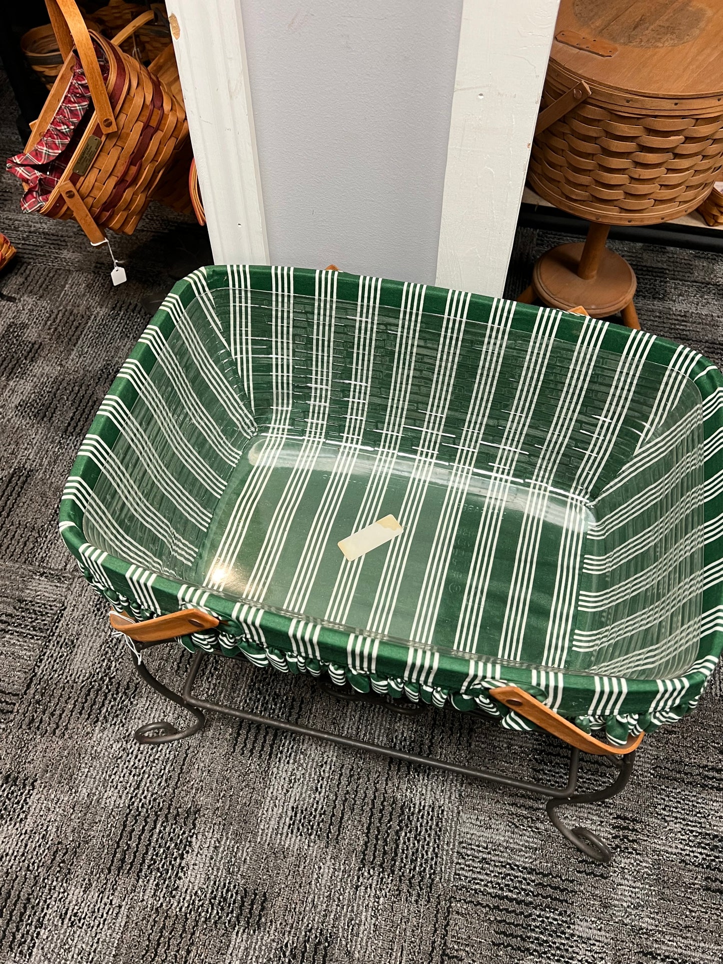 Longaberger Yuletide basket with liner protector & lid on wrought iron stand