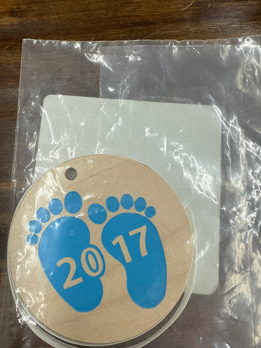 Longaberger 2017 baby tie on blue