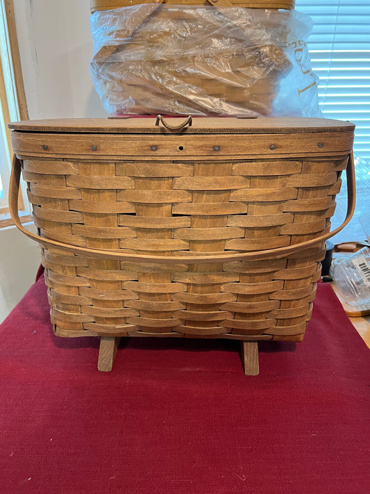 Longaberger footed magazine basket with lid