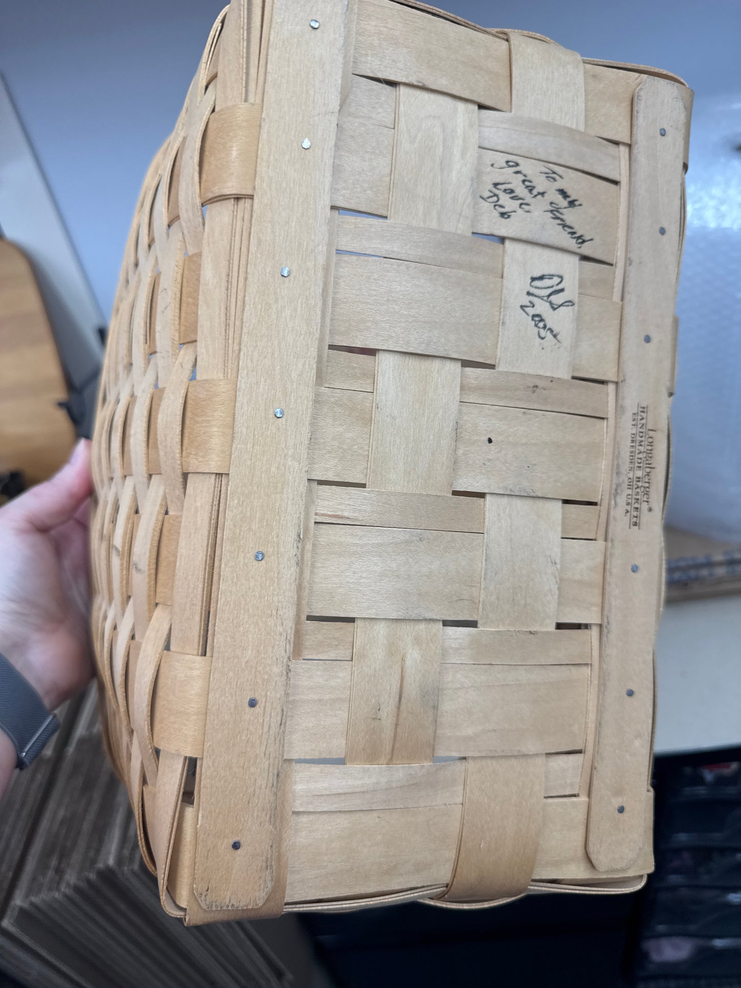 Longaberger medium market basket -has some rubbing in the front as shown and chip in corner splint