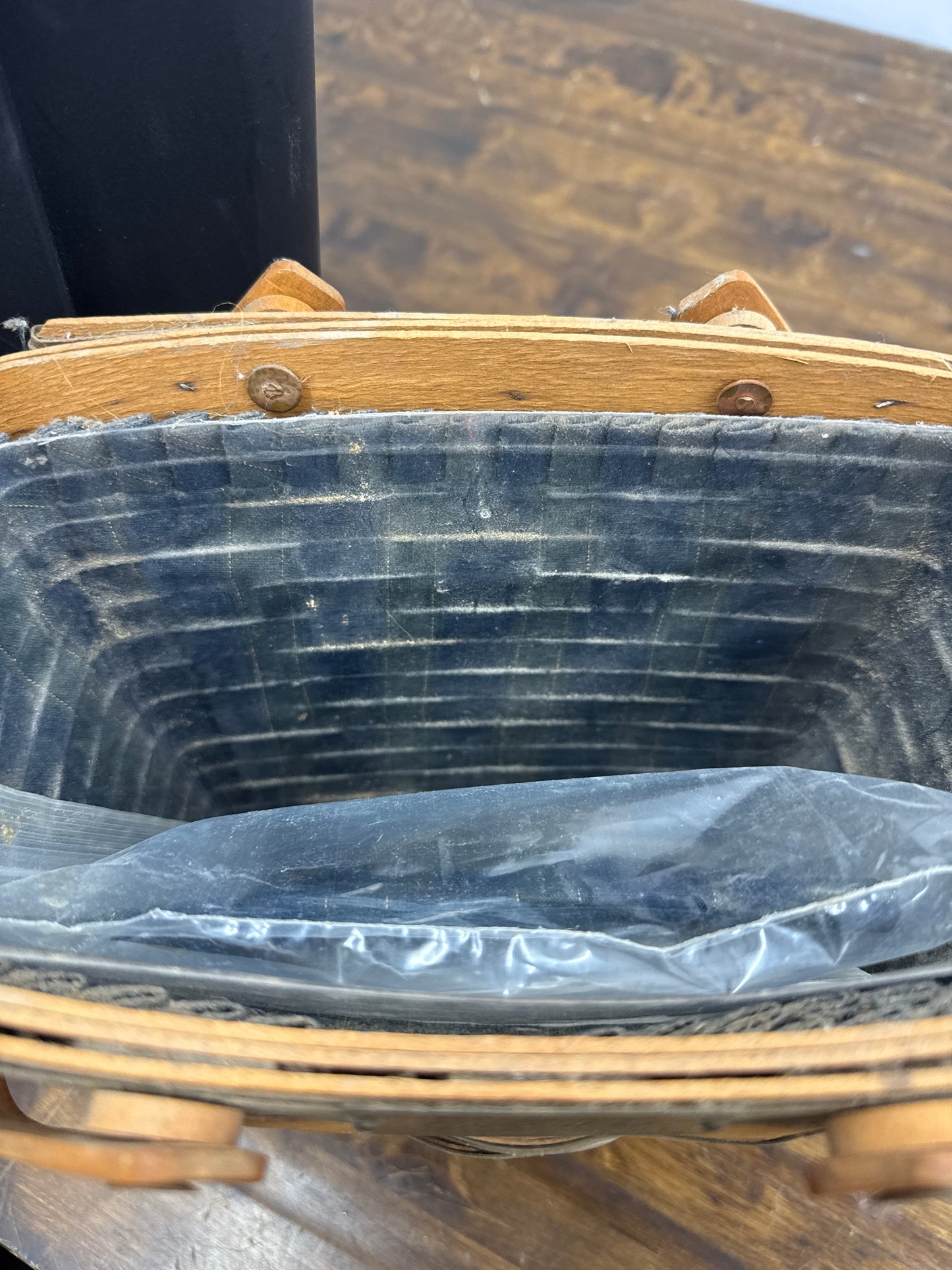 Longaberger membership basket with liner and protector and handle grip (is very dusty and will need cleaned)