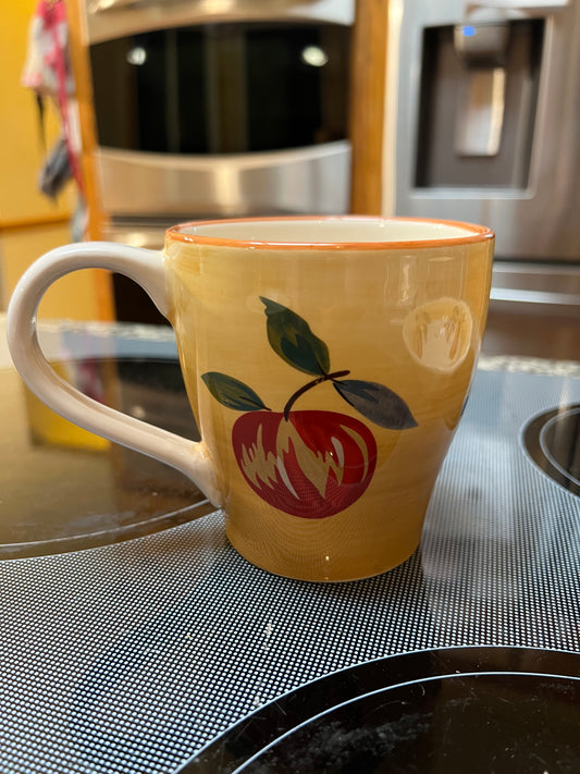 The Longaberger company coffee mug in Napa orchard