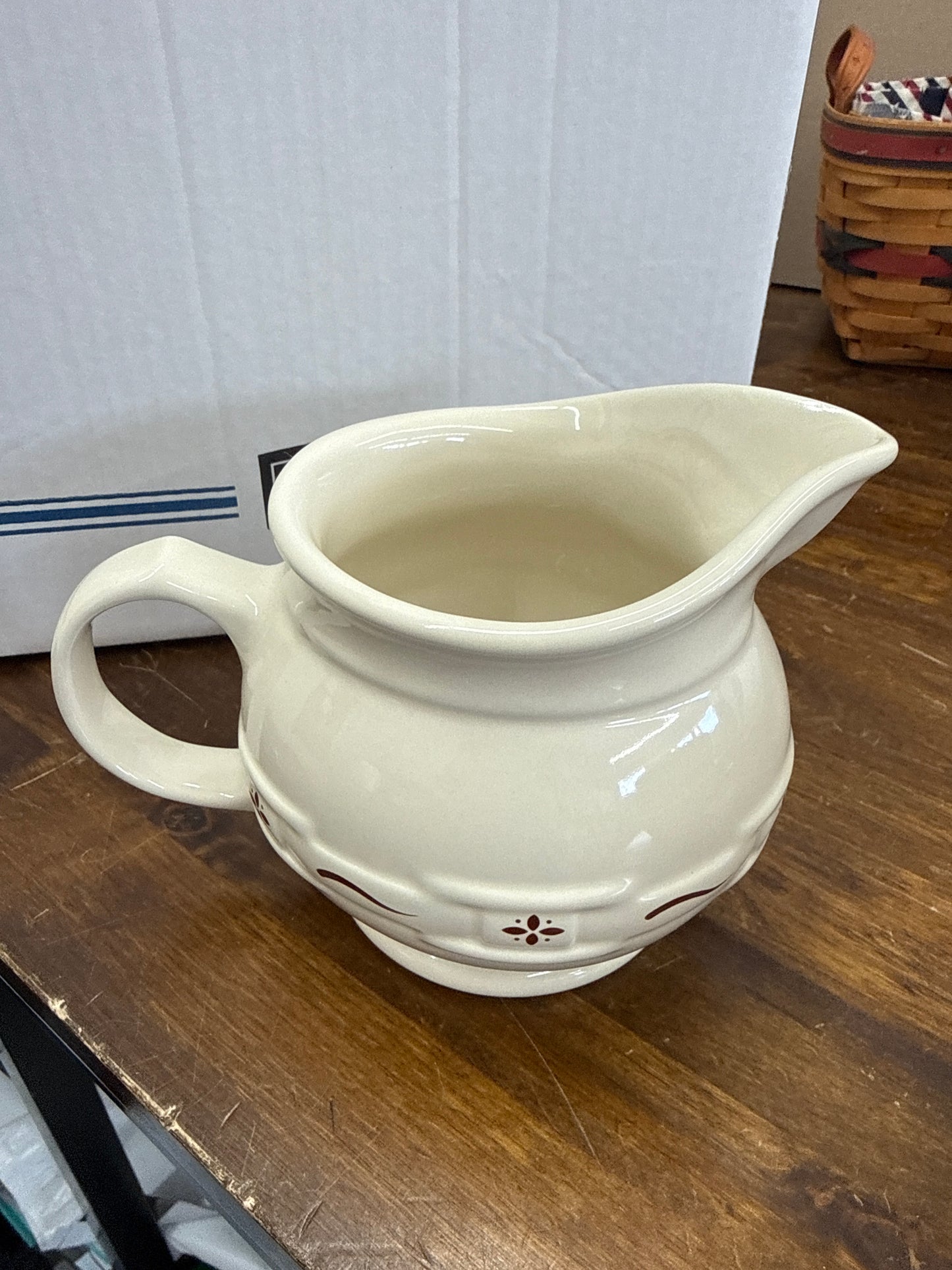 Longaberger cottage pitcher in traditional red