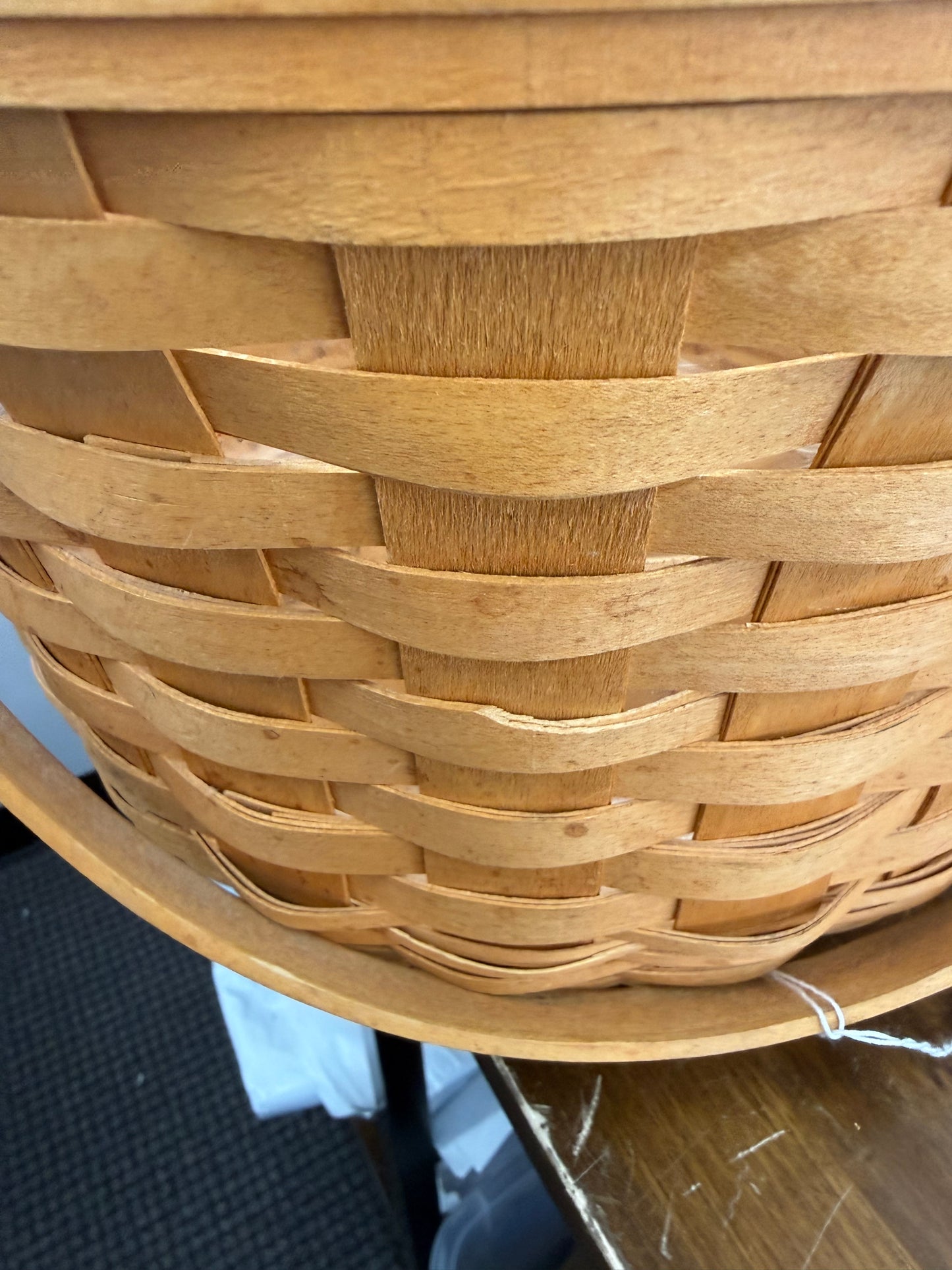 Longaberger large fruit basket with protector (has a cracked splint and spots on basket)