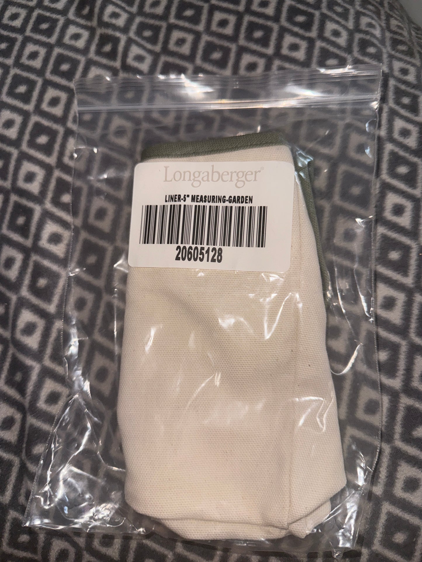 Longaberger 5” Measuring Liner in garden