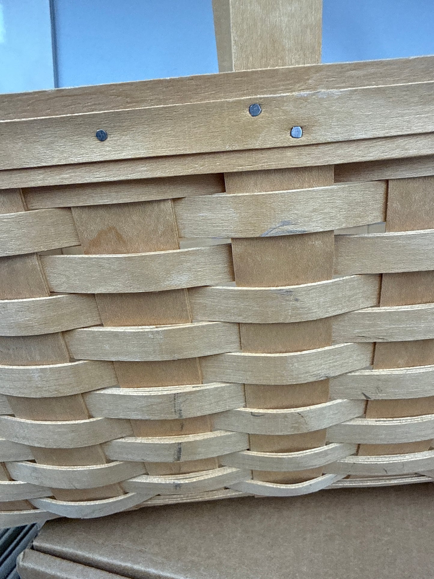 Longaberger medium market basket -has some rubbing in the front as shown and chip in corner splint