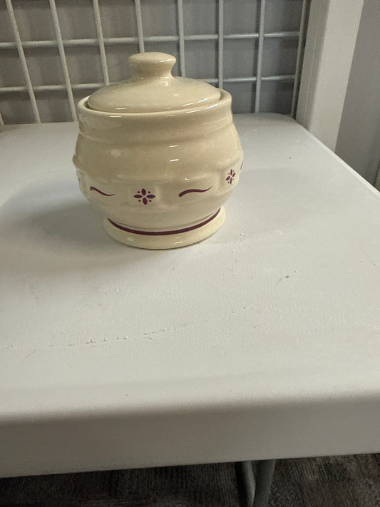 Longaberger sugar bowl with lid in traditional red