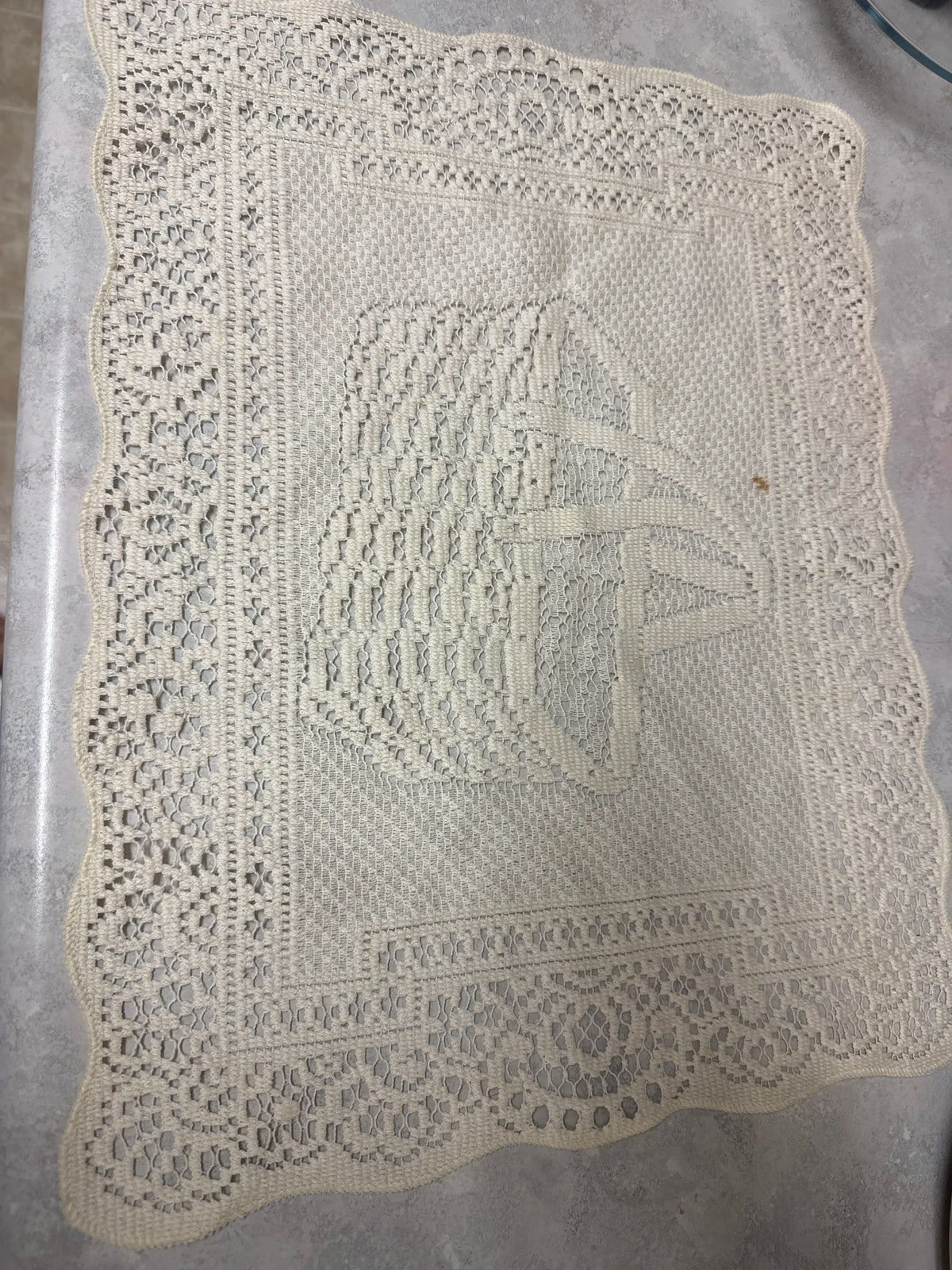 Homestead basket doily- has small stain as shown