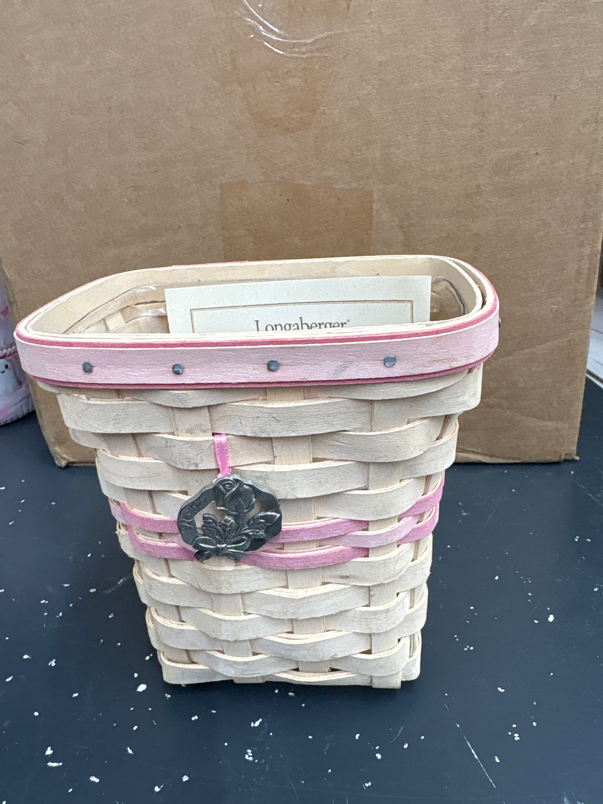 Longaberger 2004 Horizon of Hope Basket with Protector and Tie on in White Wash. A few metal marks on front.