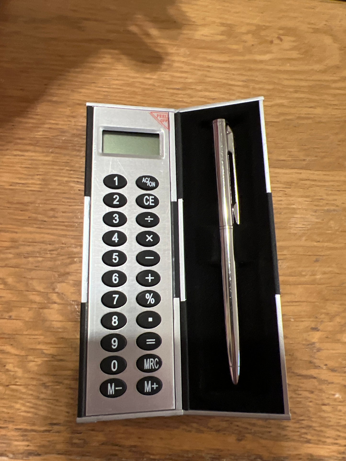 Longaberger calculator/ pen. Might need batteries.