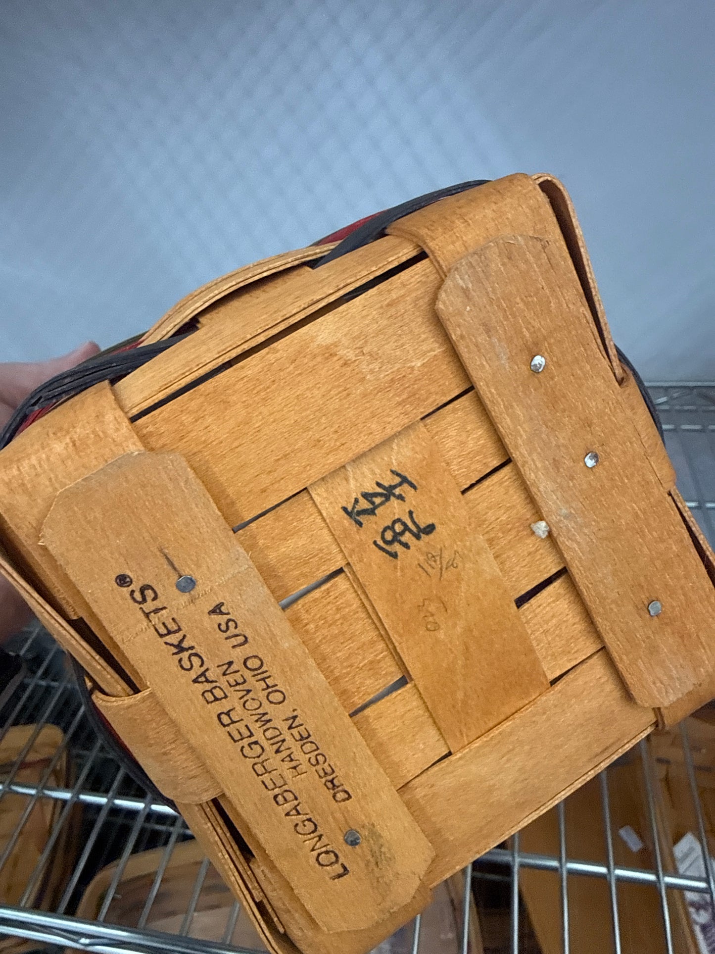 Longaberger large peg basket with protector and staining in one side)