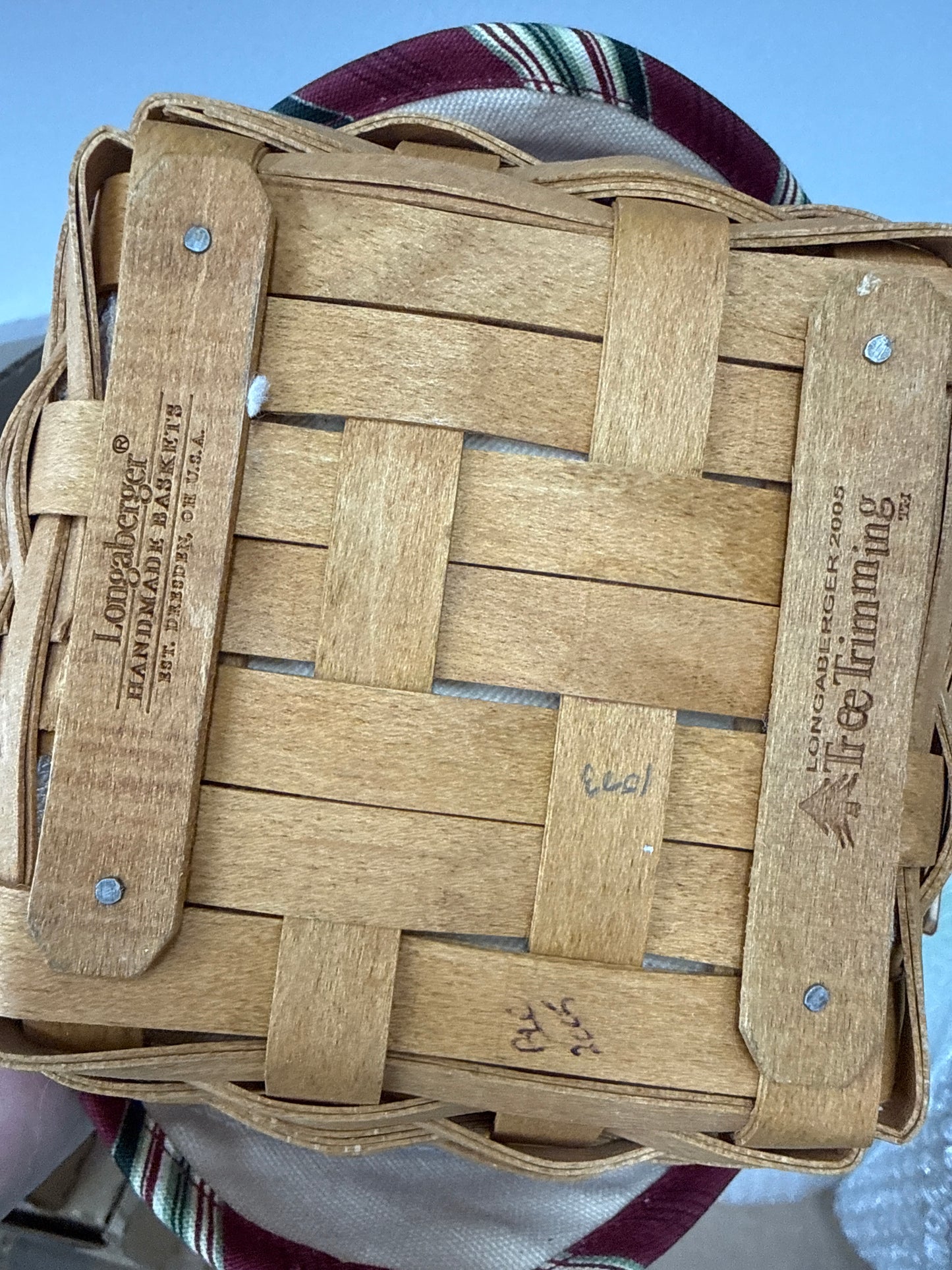 Longaberger tree trimming tinsel basket with liner, protector, and tie on