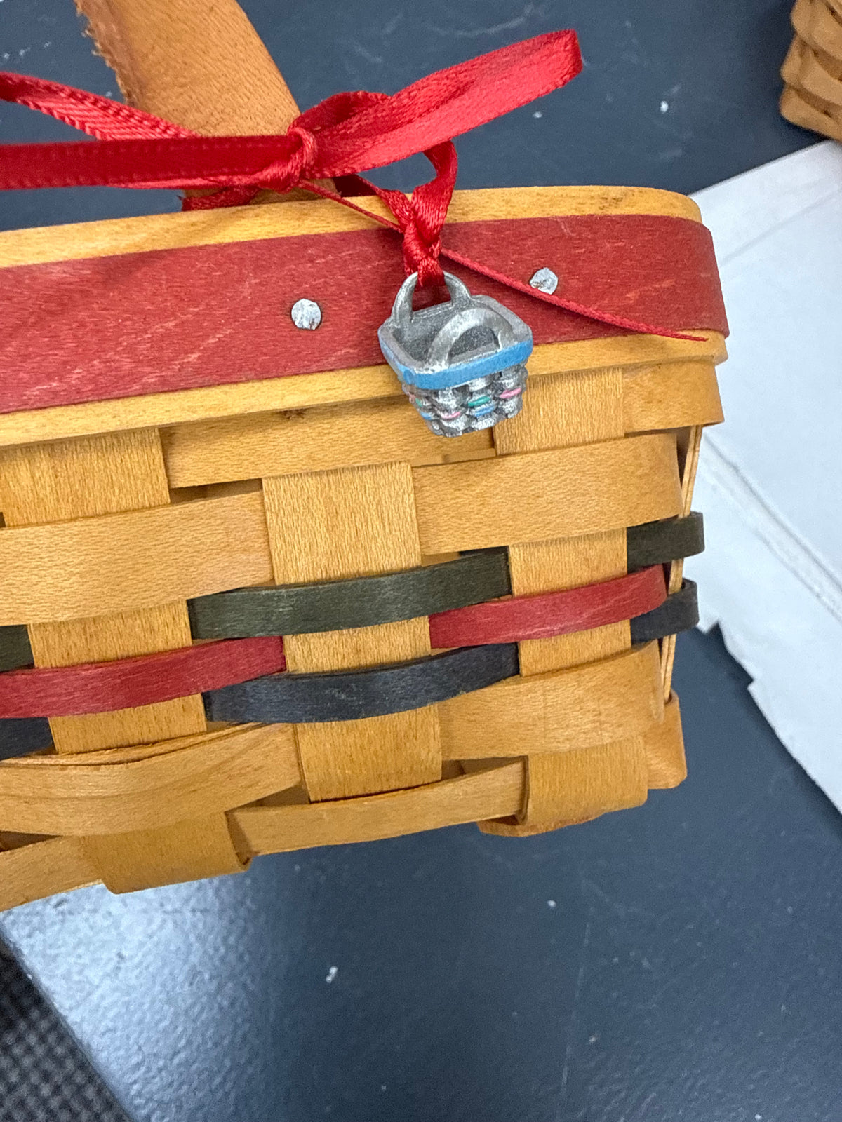 Longaberger small berry basket with little pewter basket tied on it