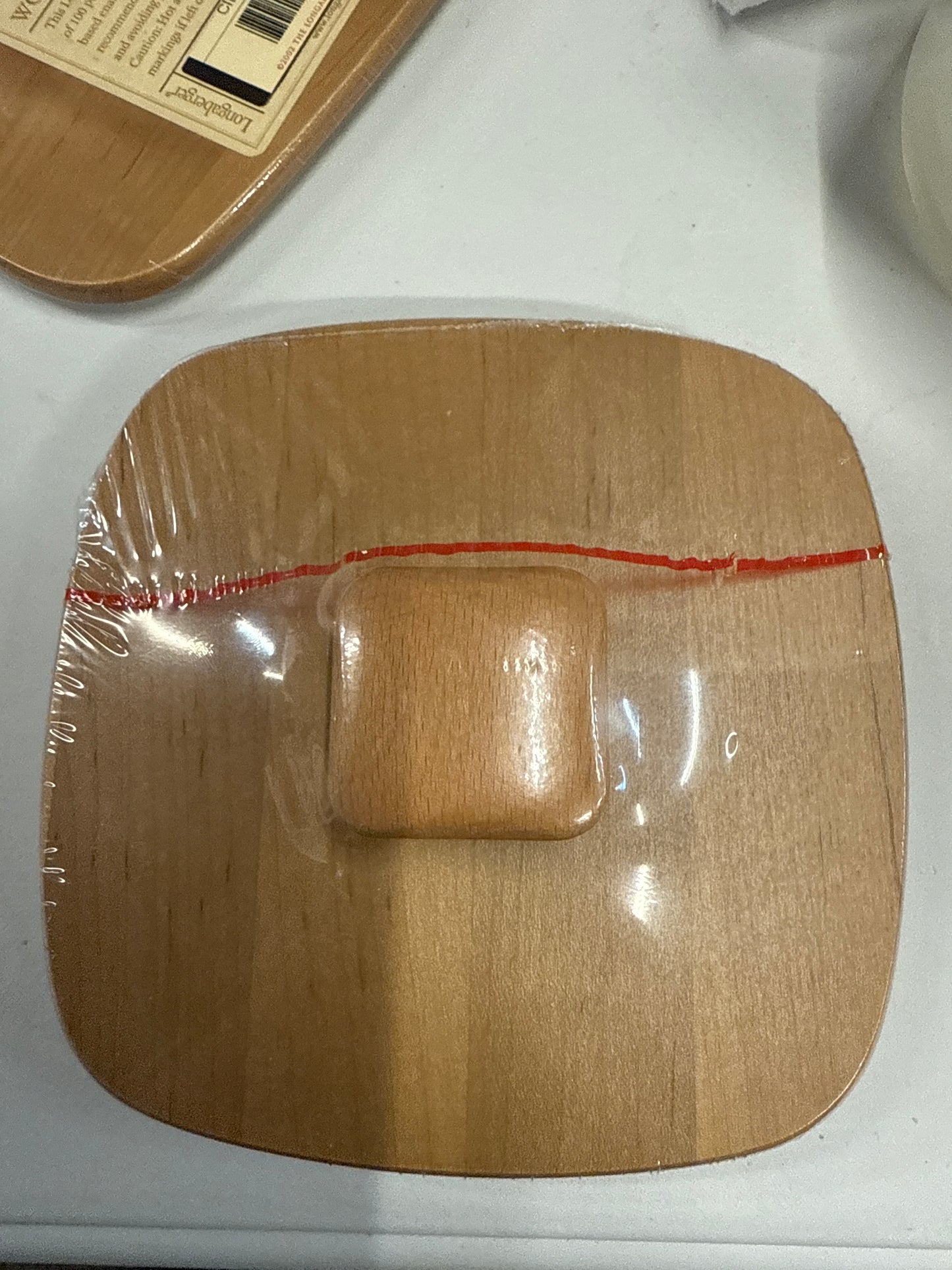 Teaspoon lid in warm brown