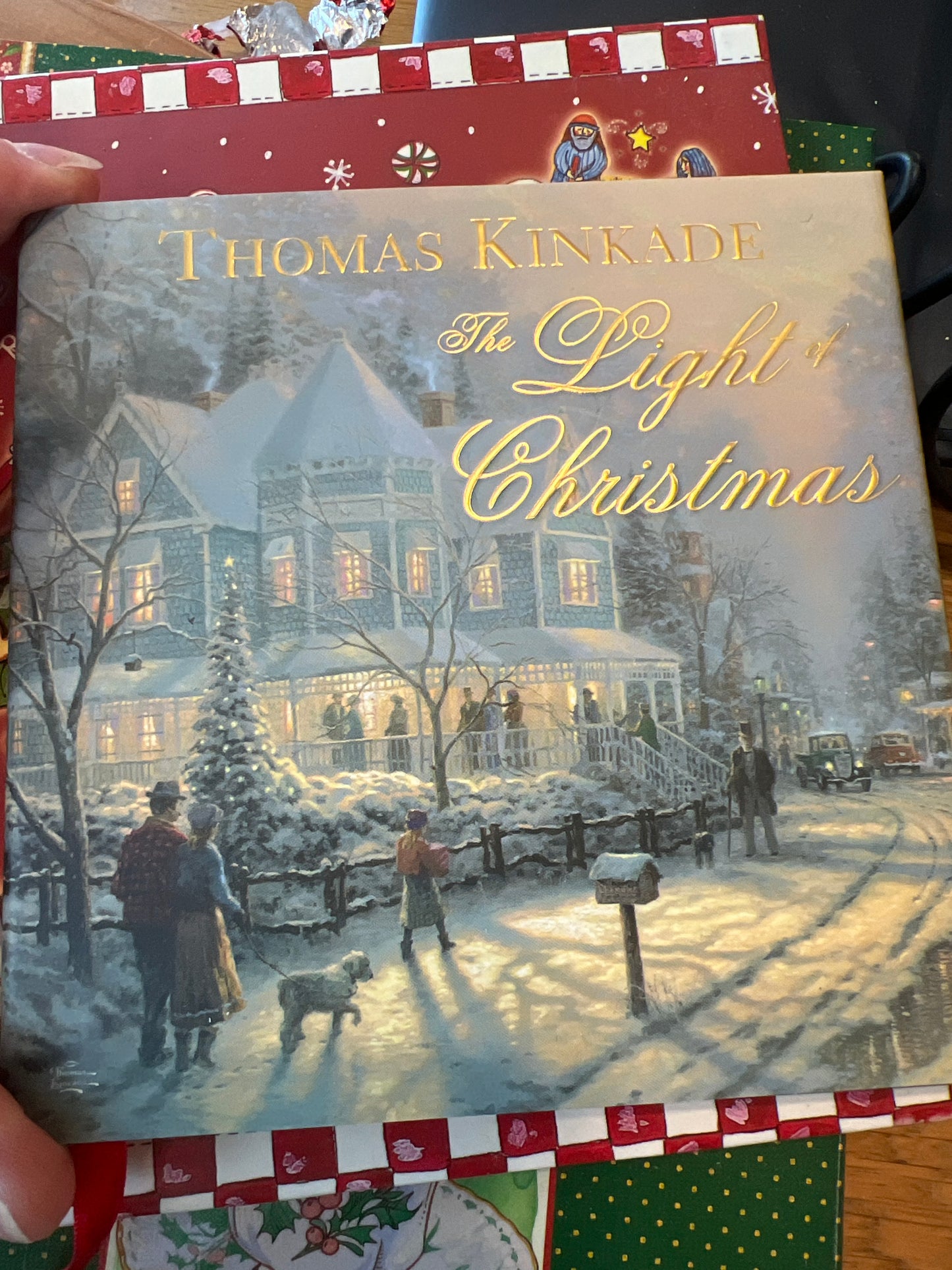 Thomas Kinkade the light of Christmas book