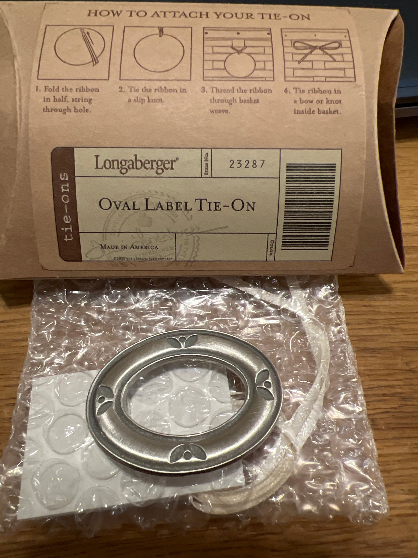 Longaberger oval label tie on (may not be in box)