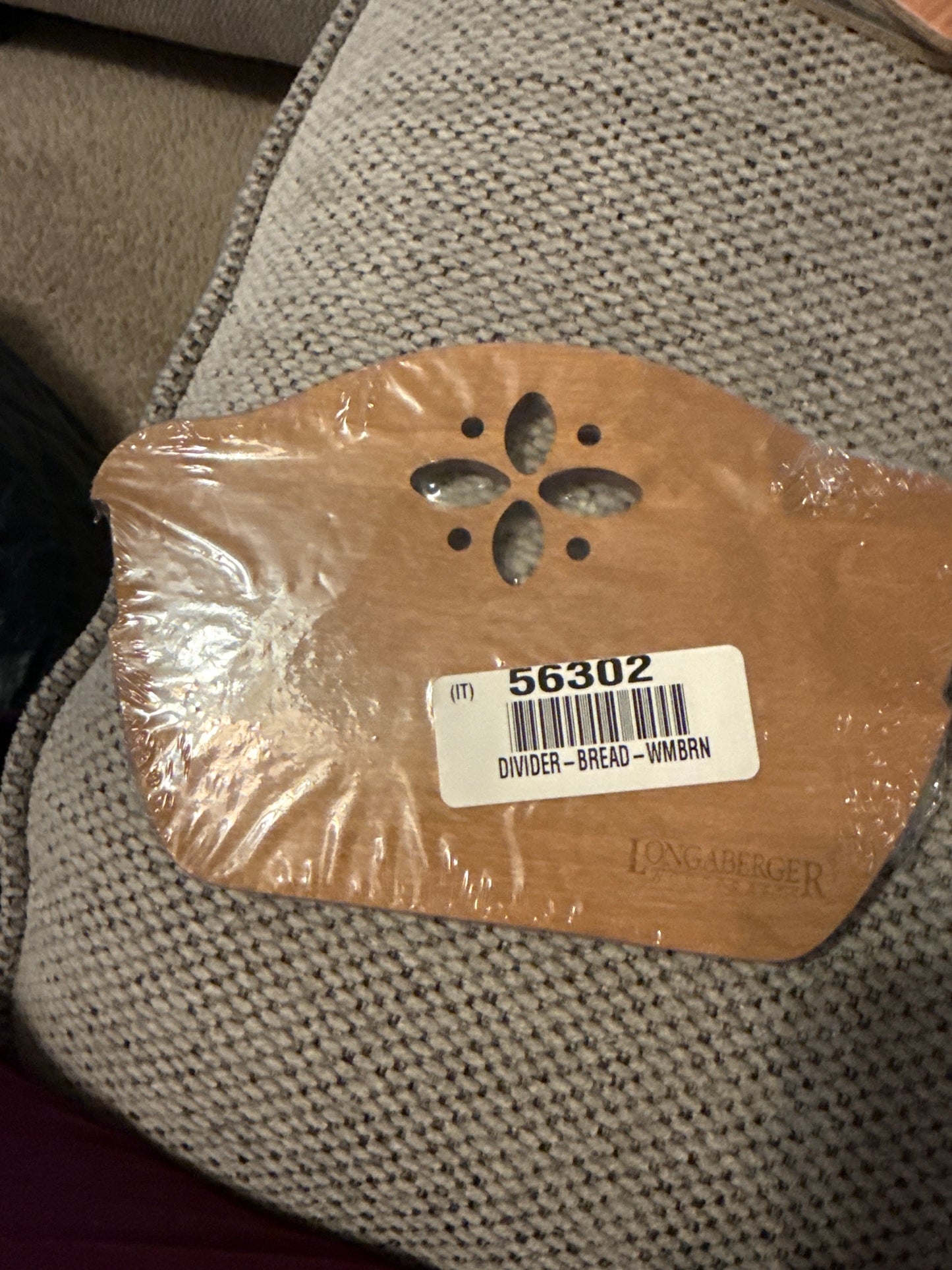 Longaberger bread divider in warm brown