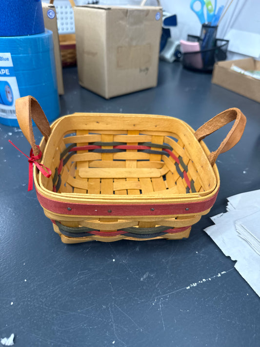 Longaberger small berry basket with little pewter basket tied on it
