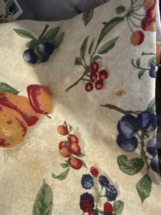 Longaberger apron in fruit medley -has a few spots and needs cleaned