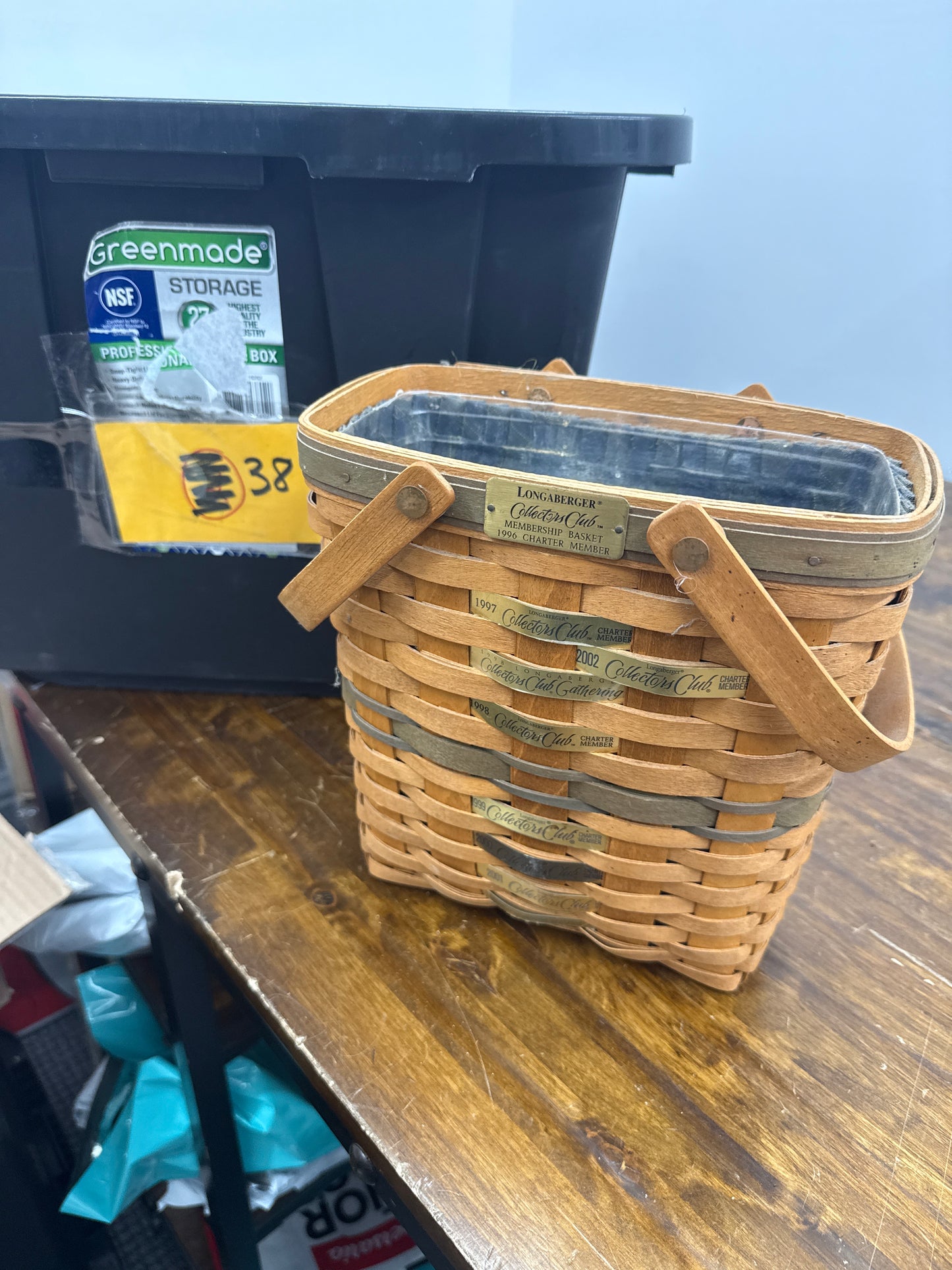 Longaberger membership basket with liner and protector and handle grip (is very dusty and will need cleaned)