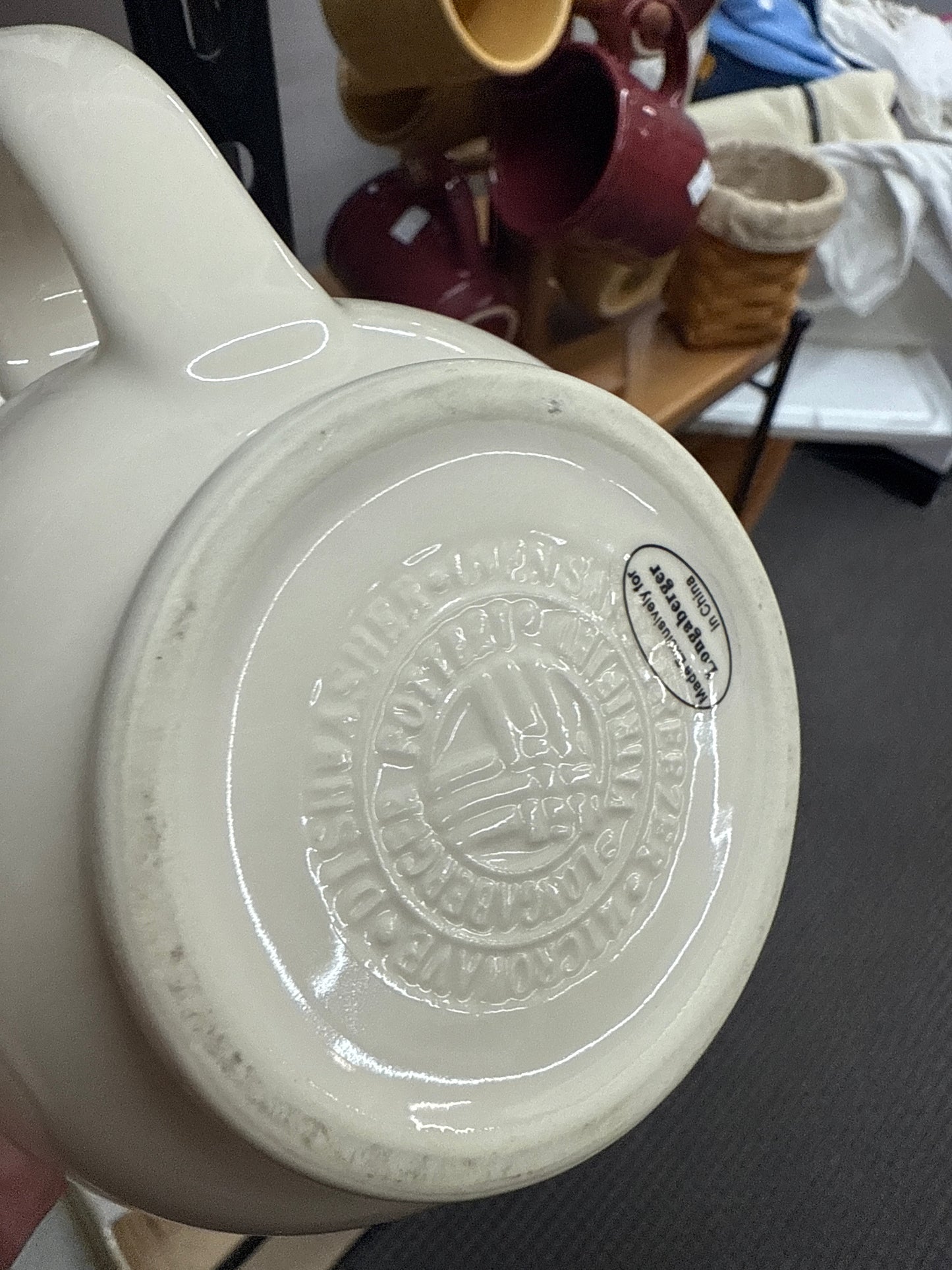 Longaberger cottage pitcher in traditional red