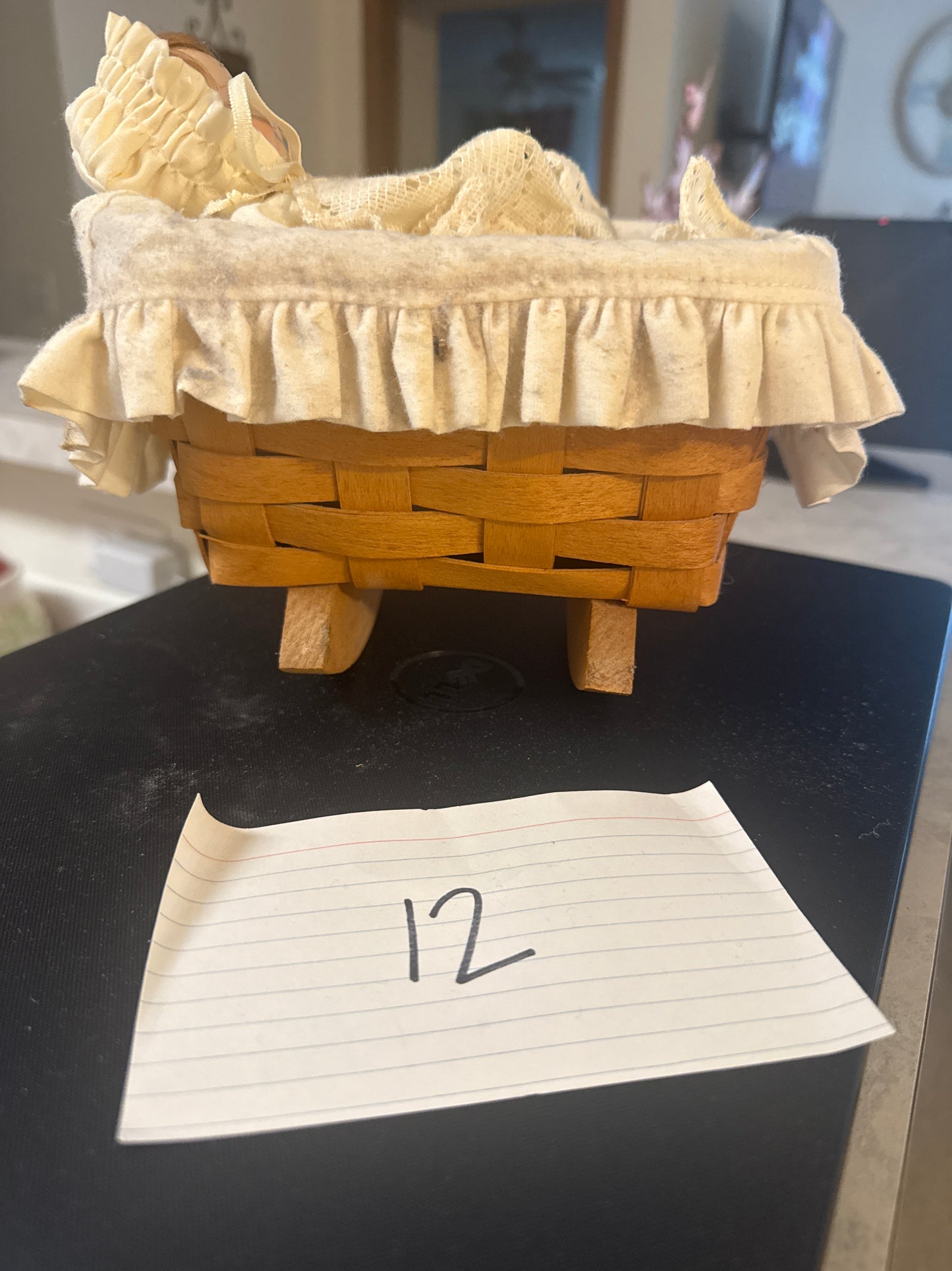 Longaberger cradle with doll (liner needs washed)