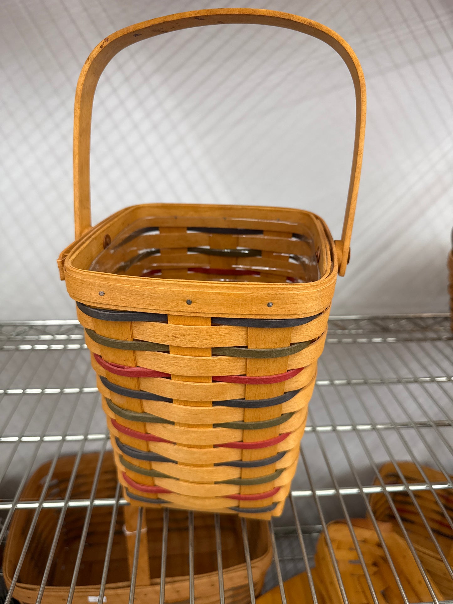 Longaberger large peg basket with protector and staining in one side)