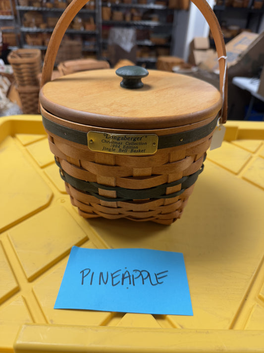 Longaberger jingle bell with lid,liner, and tie on