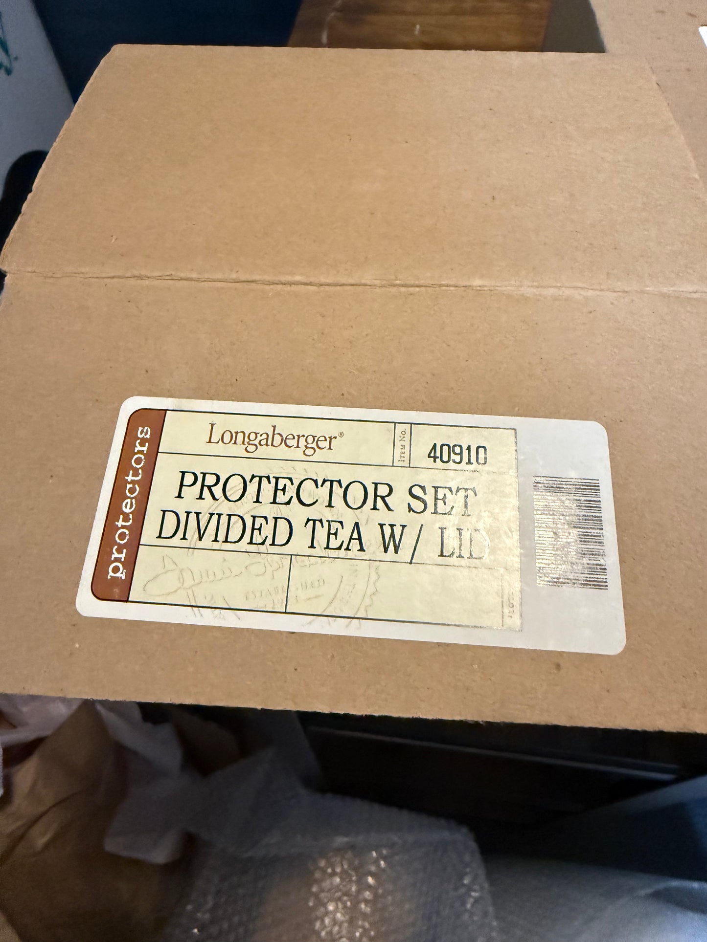 #40888 Longaberger protector tea set divided with lid. May or may not have a box