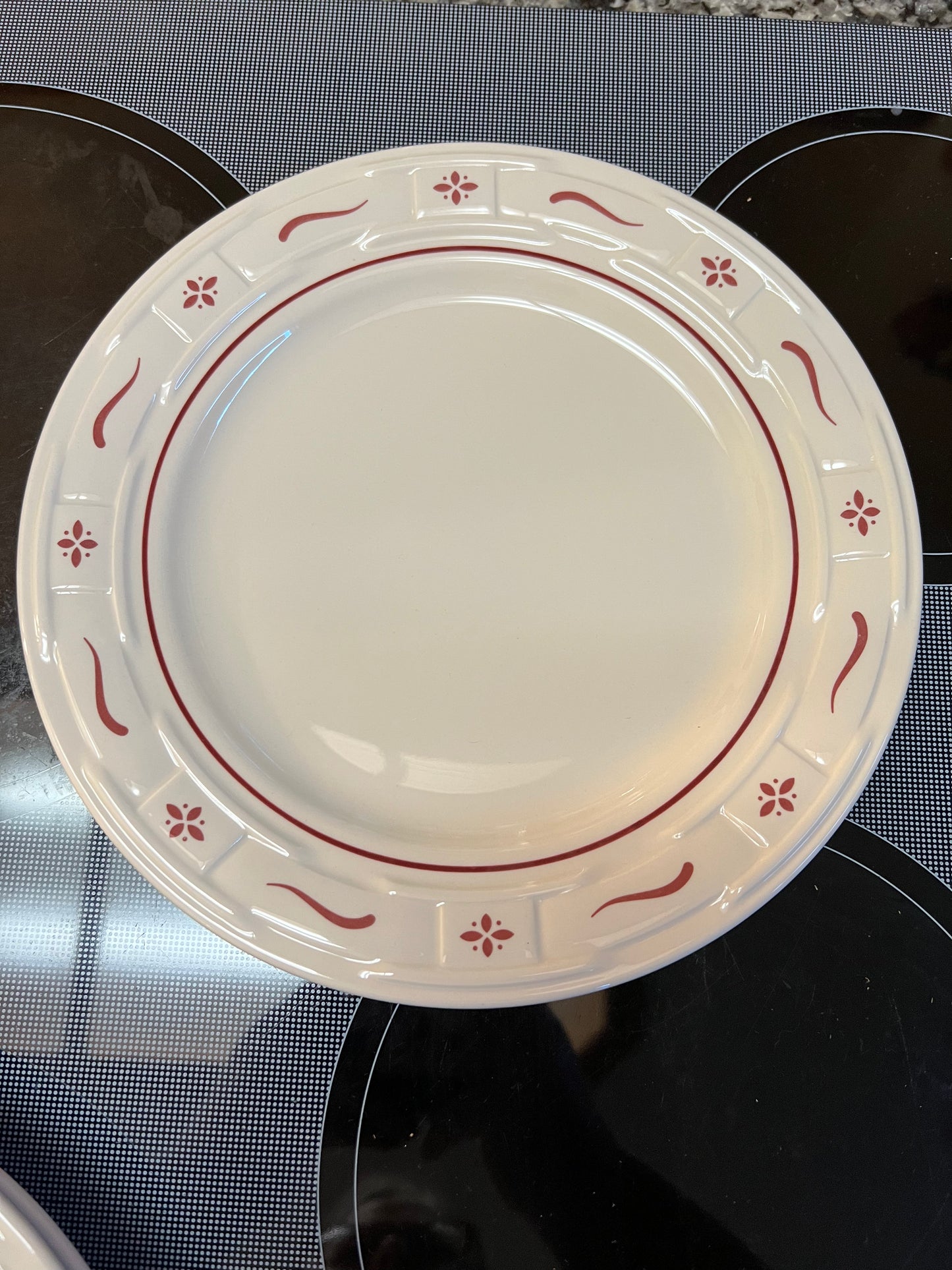 Longaberger dinner plate in traditional red