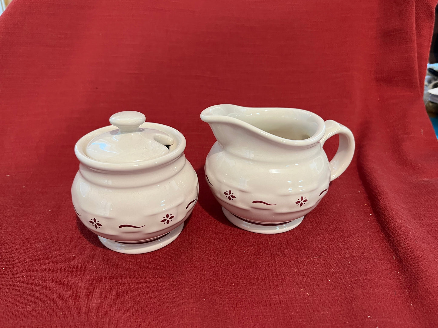 Longaberger sugar/creamer set in traditional red