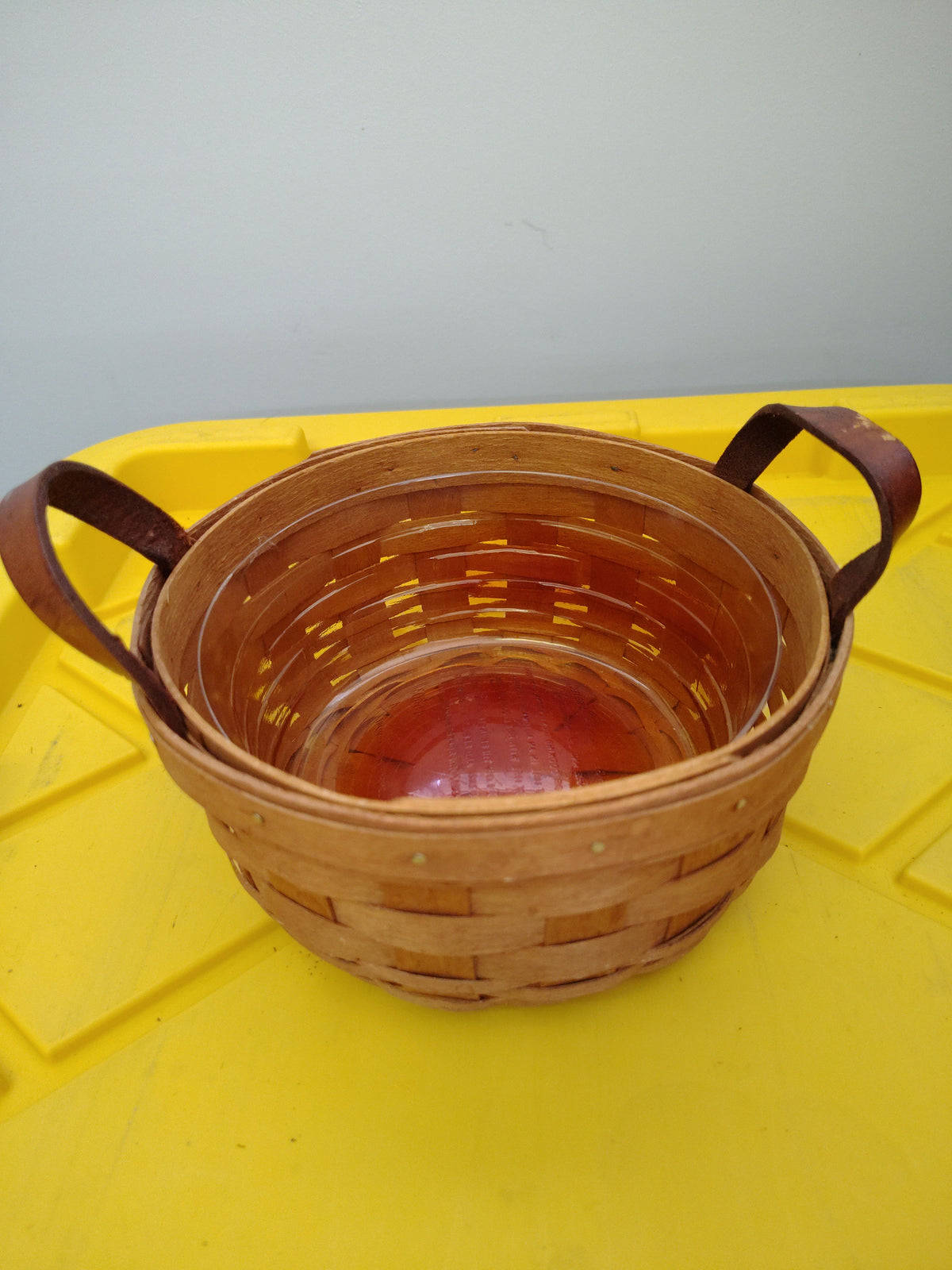 Longaberger button basket with stained protector